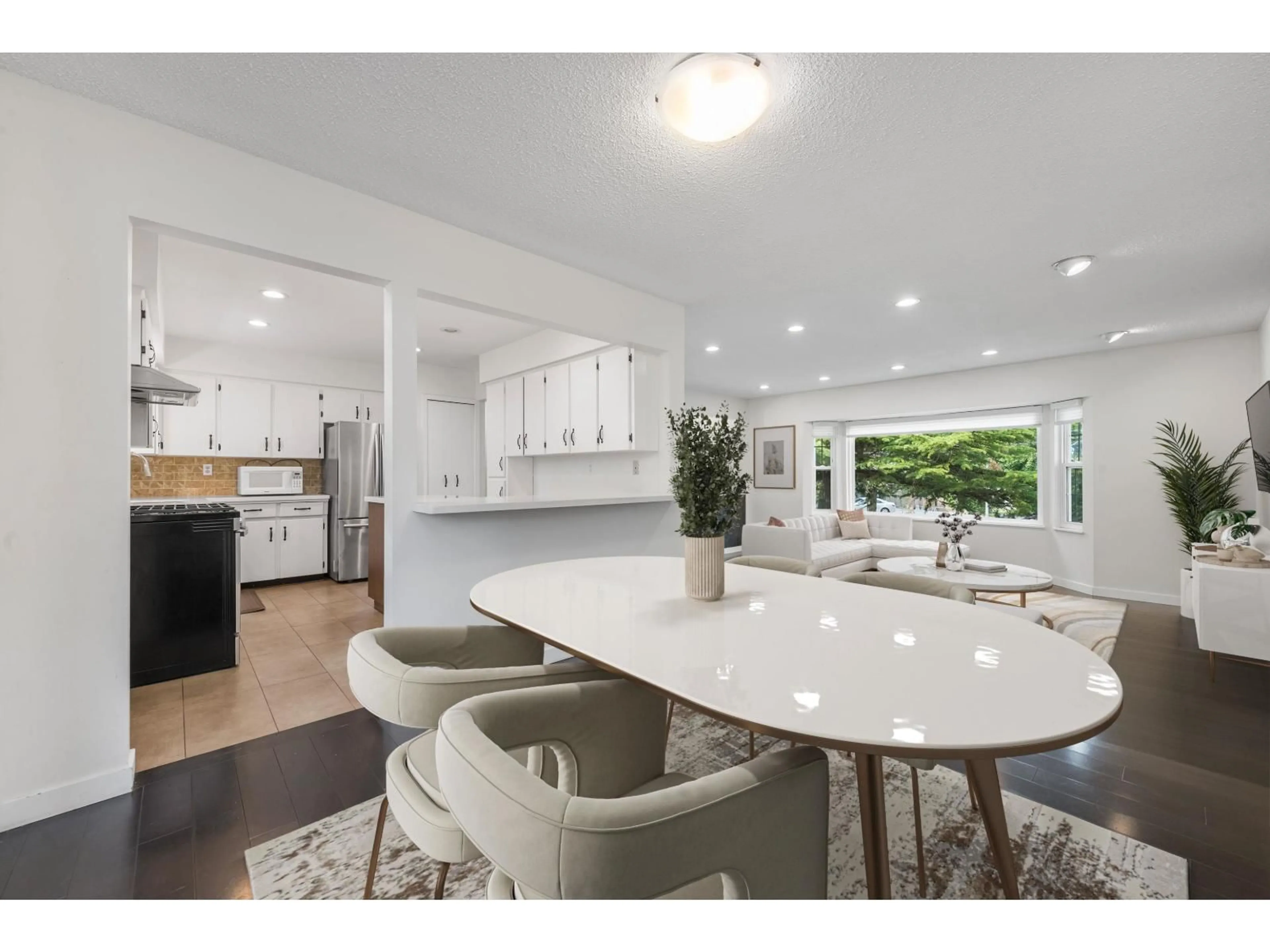 Open concept kitchen, ceramic/tile floor for 10996 82 AVENUE, Delta British Columbia V4C2B3