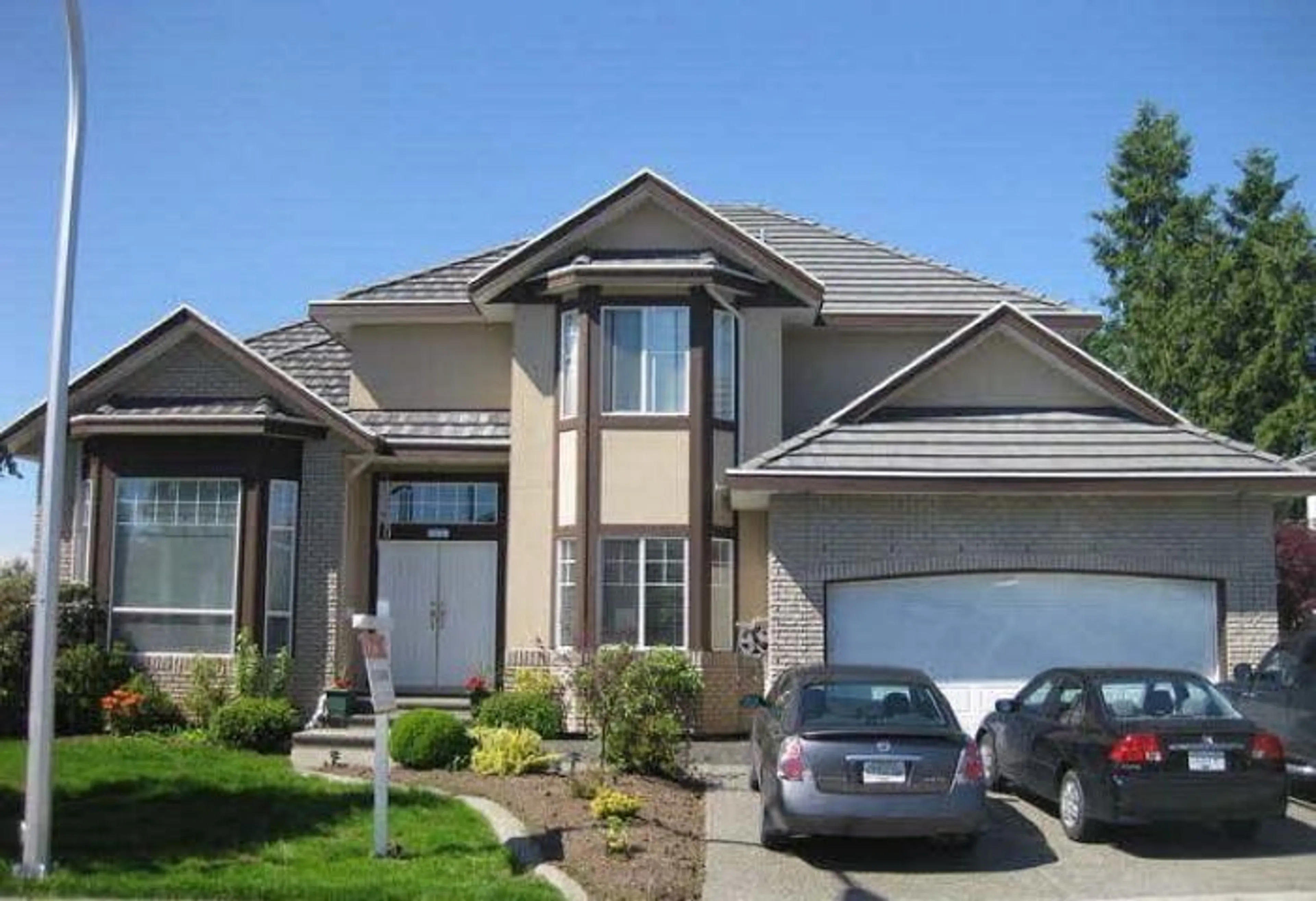 Home with vinyl exterior material, street for 7452 WILTSHIRE DRIVE, Surrey British Columbia V3S2Y7