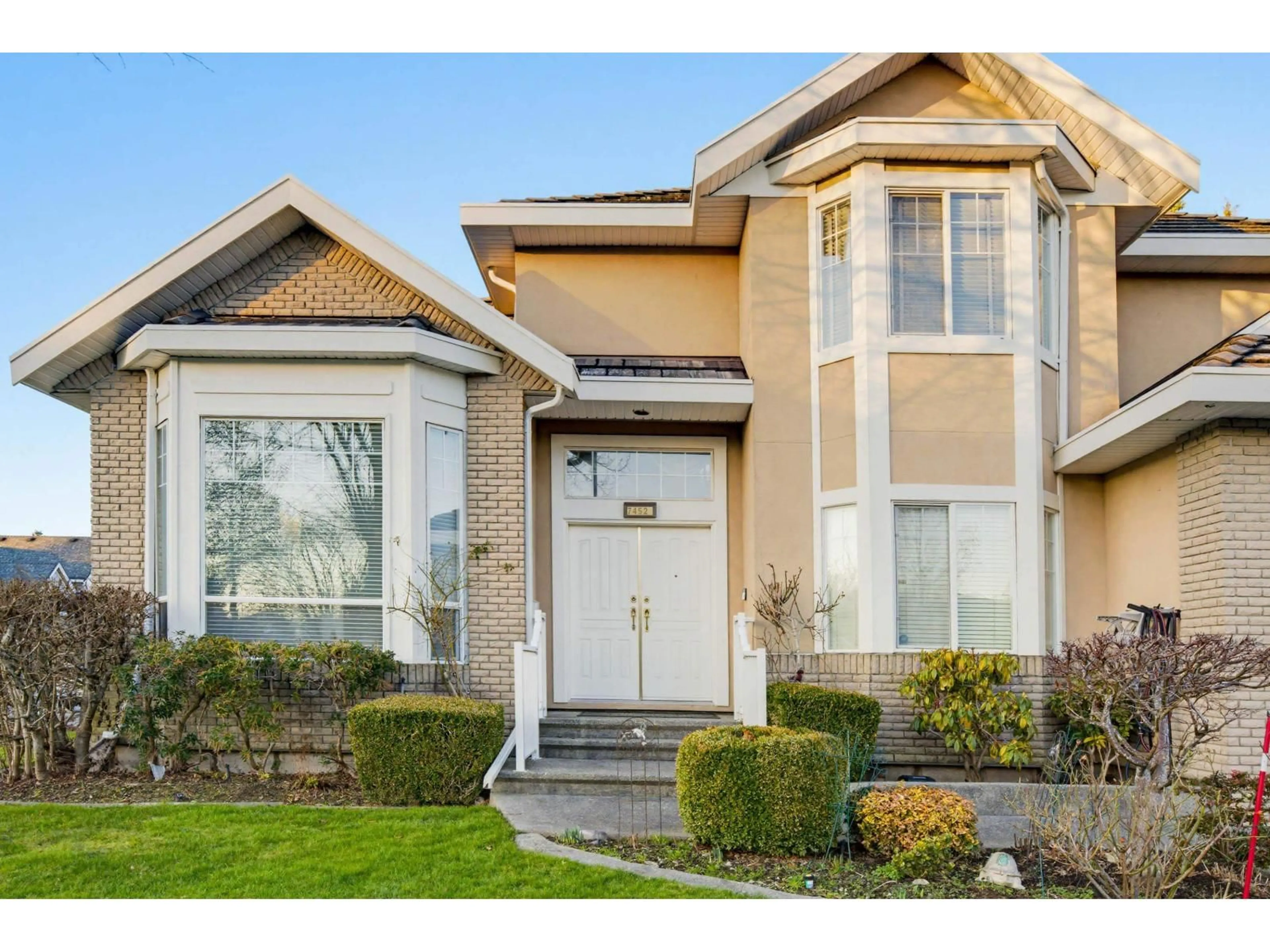 Home with vinyl exterior material, street for 7452 WILTSHIRE DRIVE, Surrey British Columbia V3S2Y7