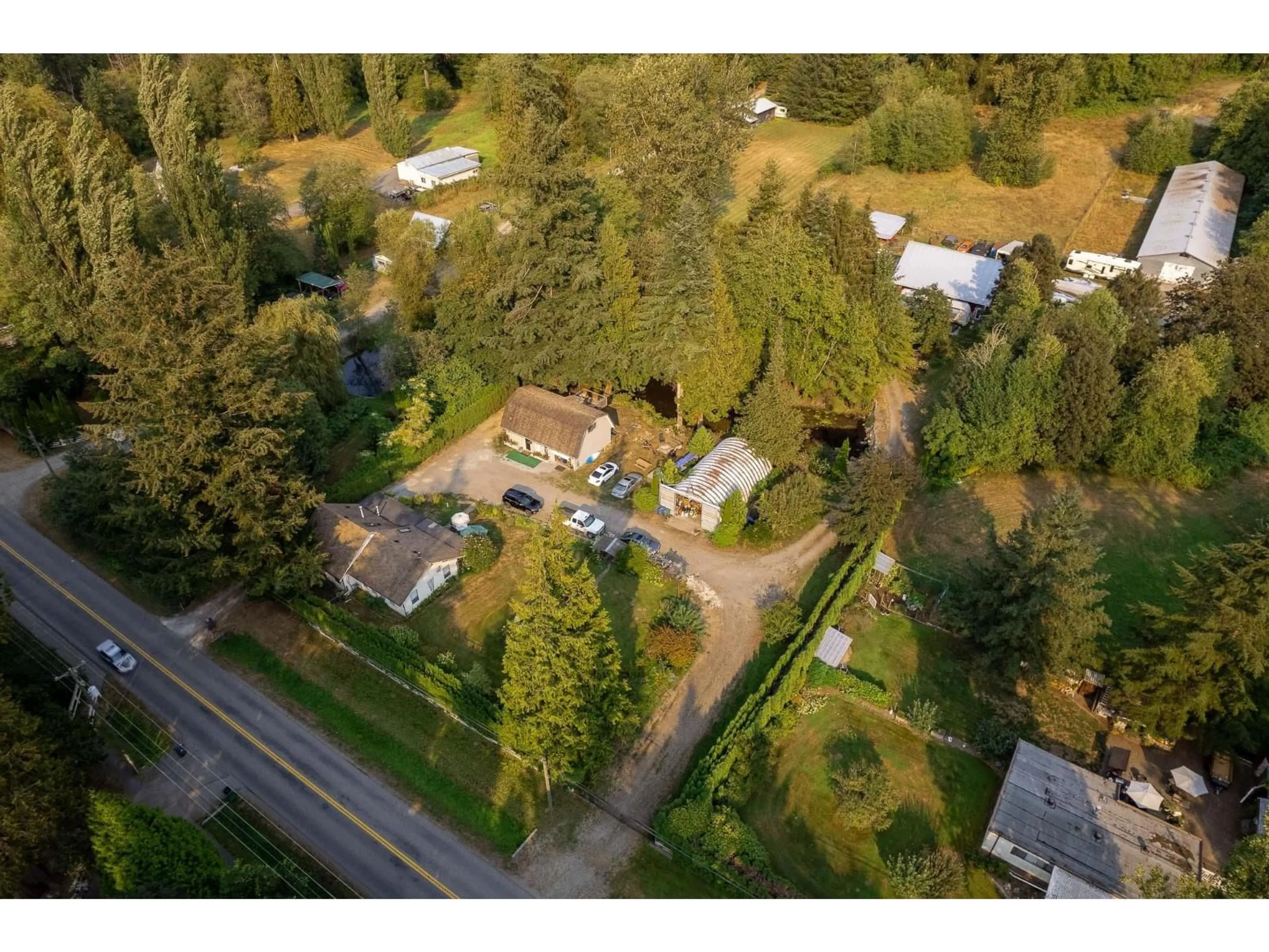 A pic from outside/outdoor area/front of a property/back of a property/a pic from drone, street for 2916 184 STREET, Surrey British Columbia V2Z9V2