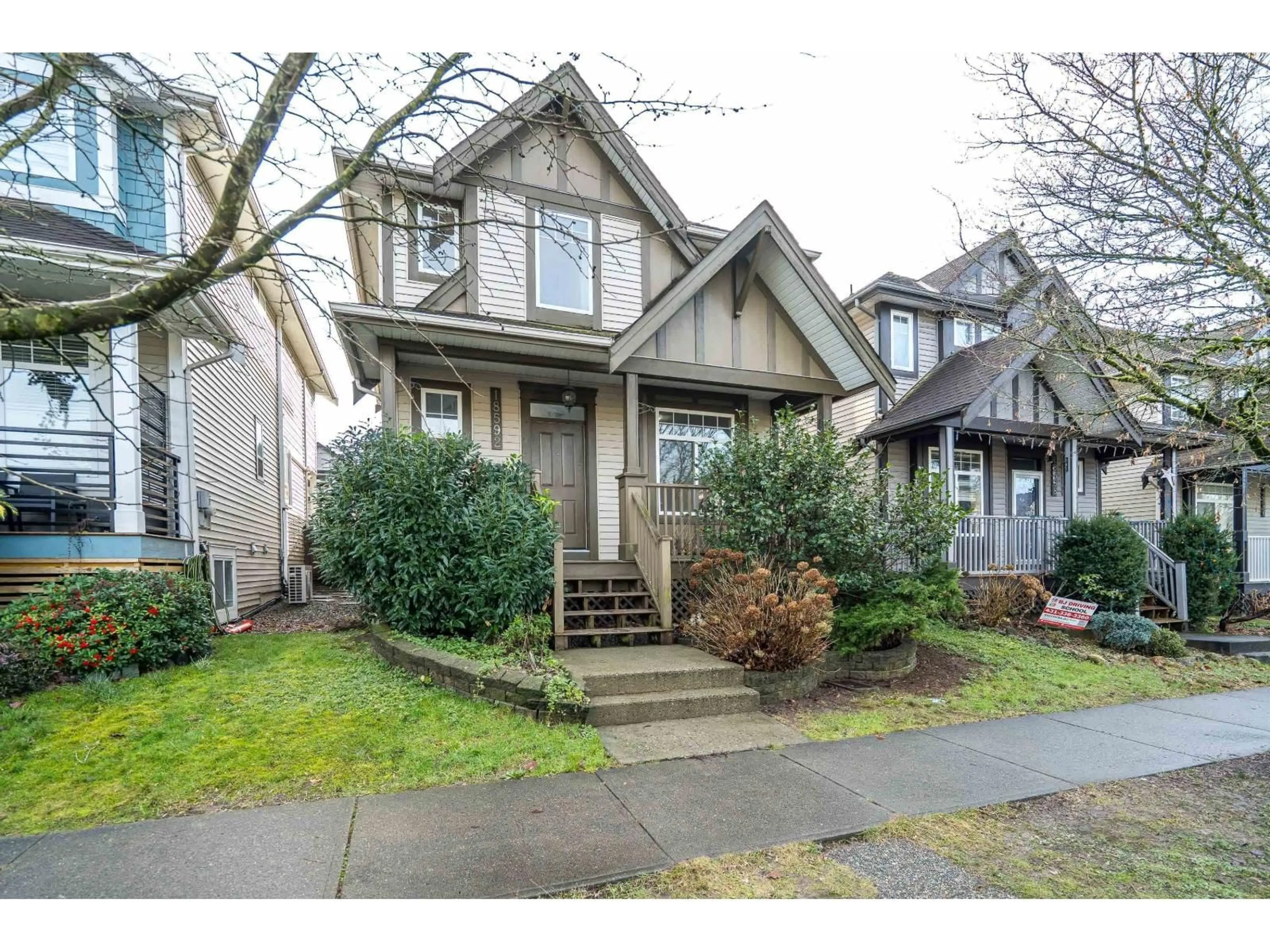 Home with vinyl exterior material, street for 18592 67 AVENUE, Surrey British Columbia V3S1Z1