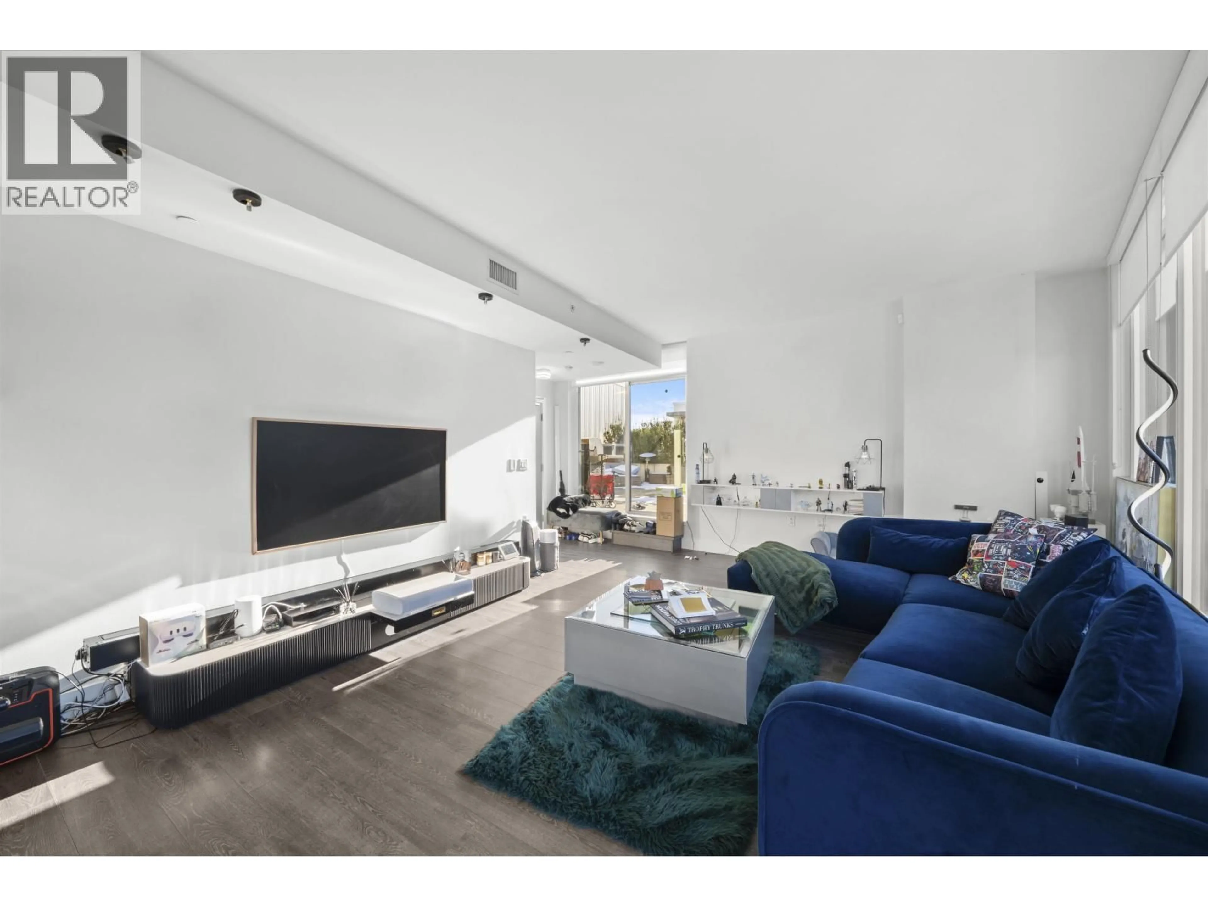 Living room with furniture, unknown for 609 - 3438 SAWMILL CRESCENT, Vancouver British Columbia V5S0E3