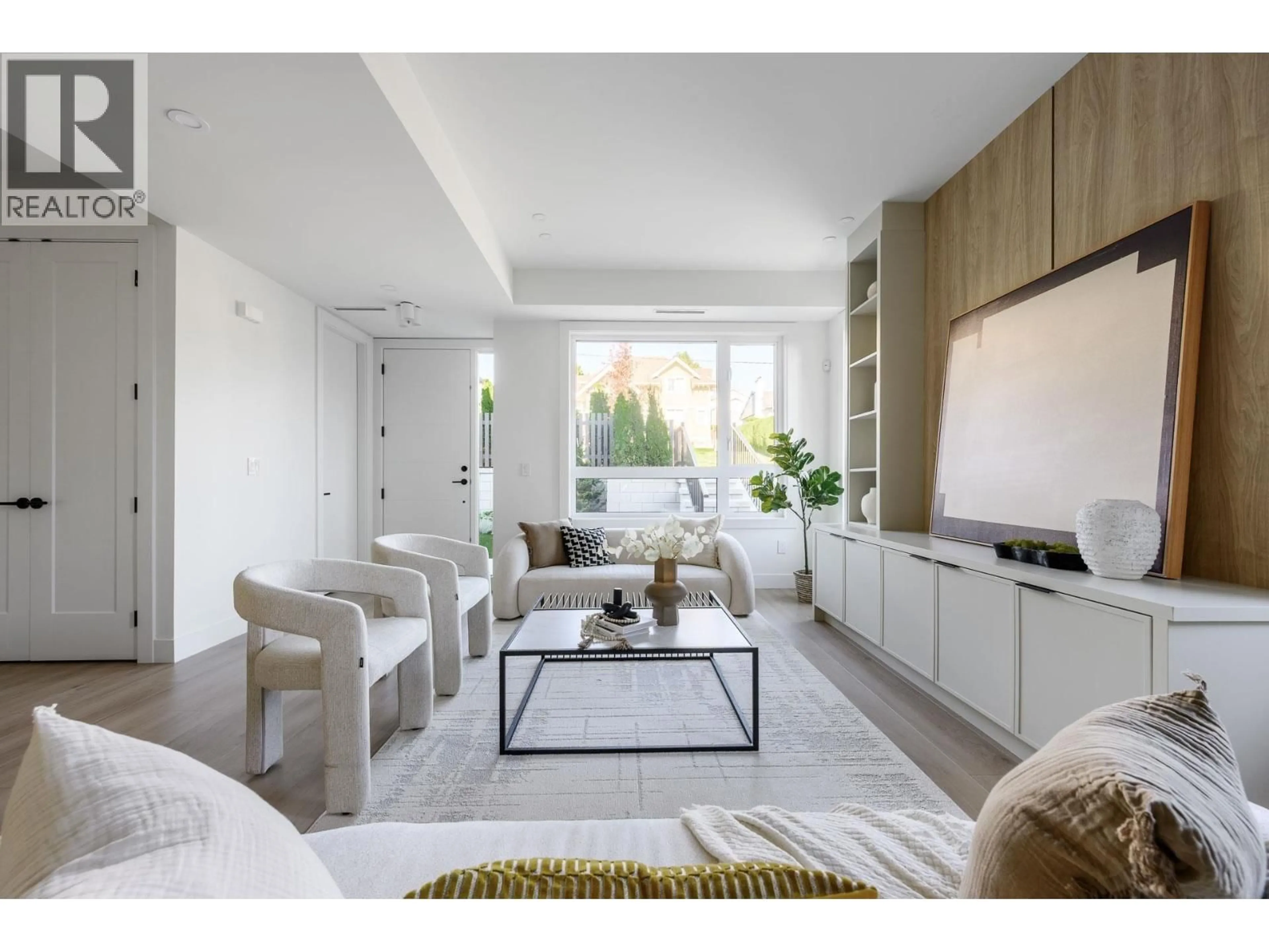 Living room with furniture, unknown for 102 - 1132 MADORE AVENUE, Coquitlam British Columbia V3K3B9