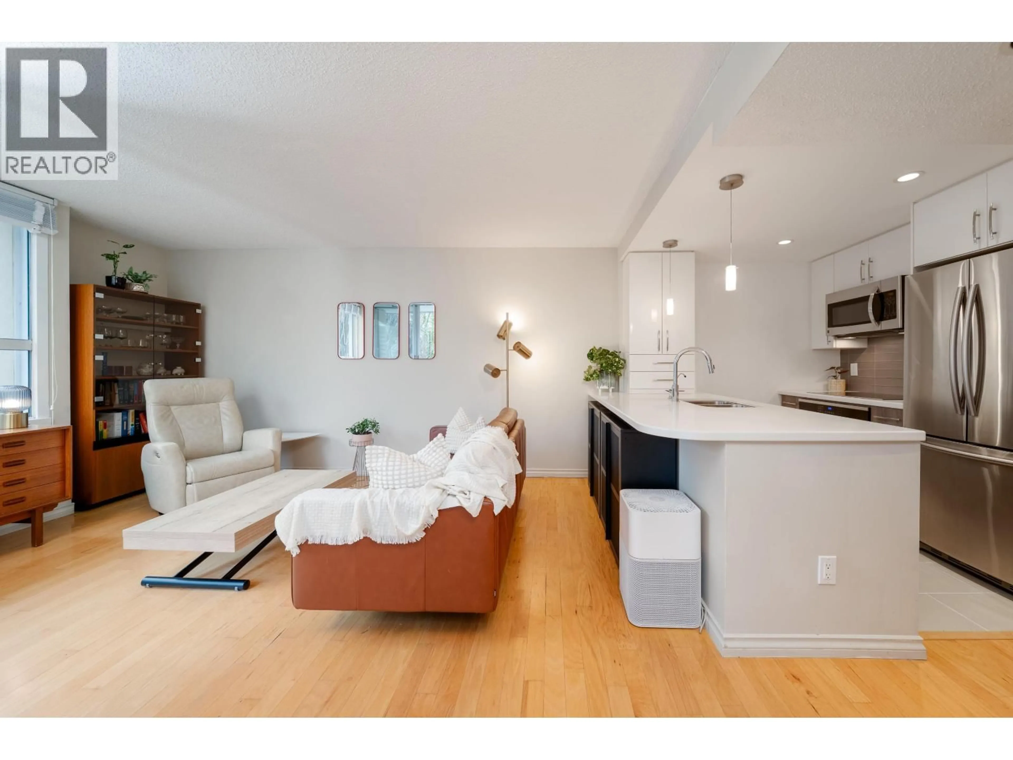 Open concept kitchen, wood/laminate floor for 401 - 1406 HARWOOD STREET, Vancouver British Columbia V6G1X5