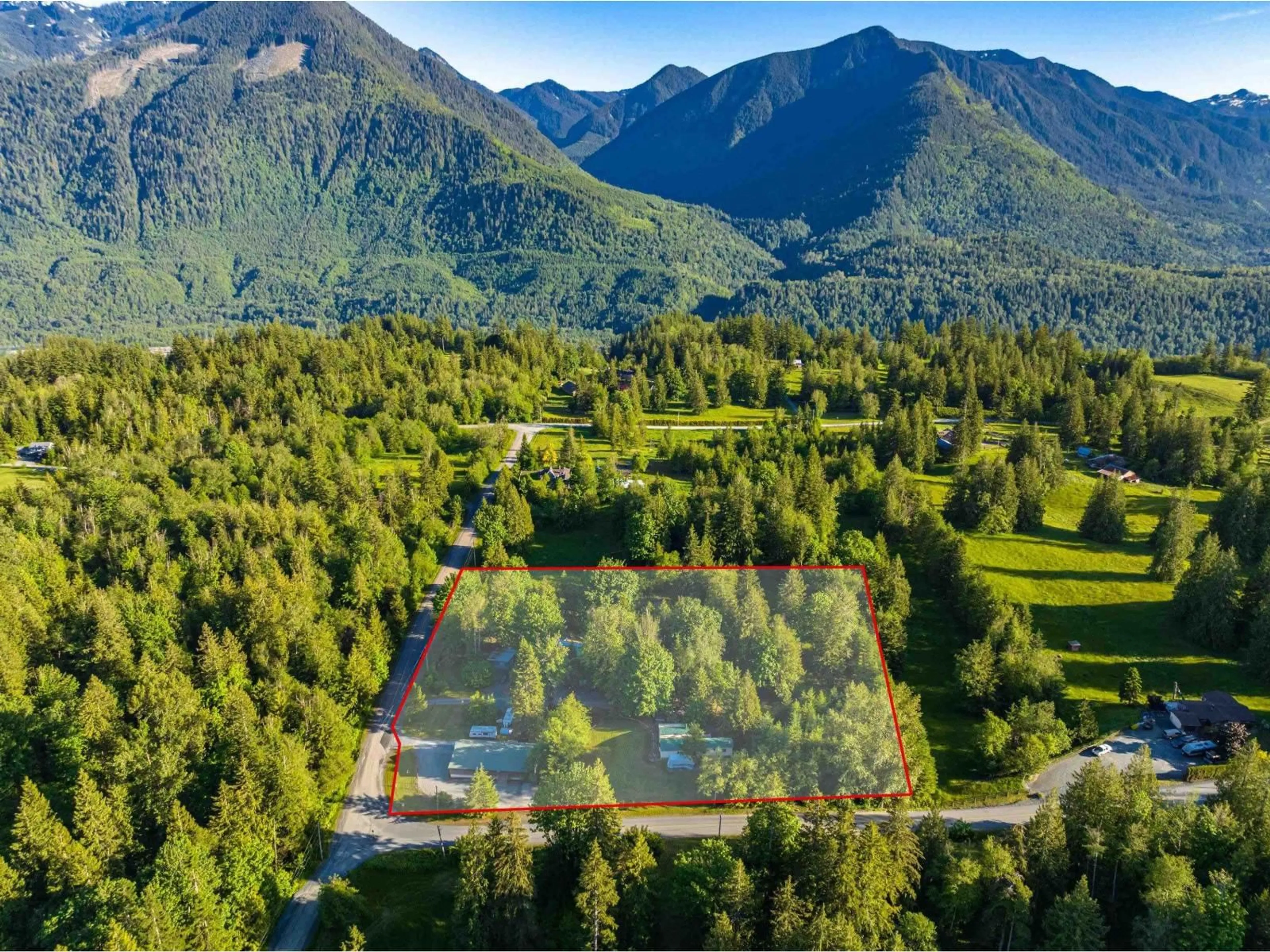 A pic from outside/outdoor area/front of a property/back of a property/a pic from drone, mountain view for 47400 EXTROM ROAD, Chilliwack British Columbia V2R4T1