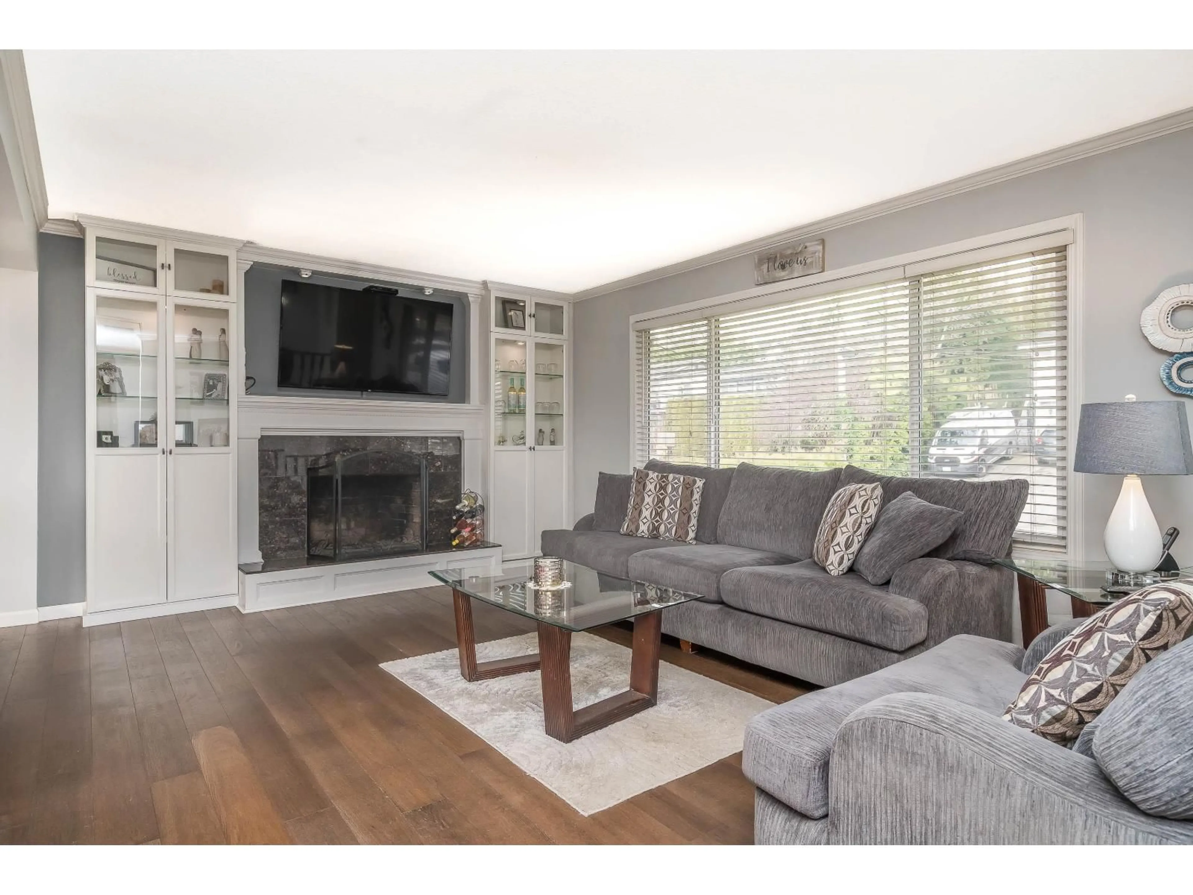 Living room with furniture, wood/laminate floor for 35104 SPENCER STREET, Abbotsford British Columbia V3G2E3