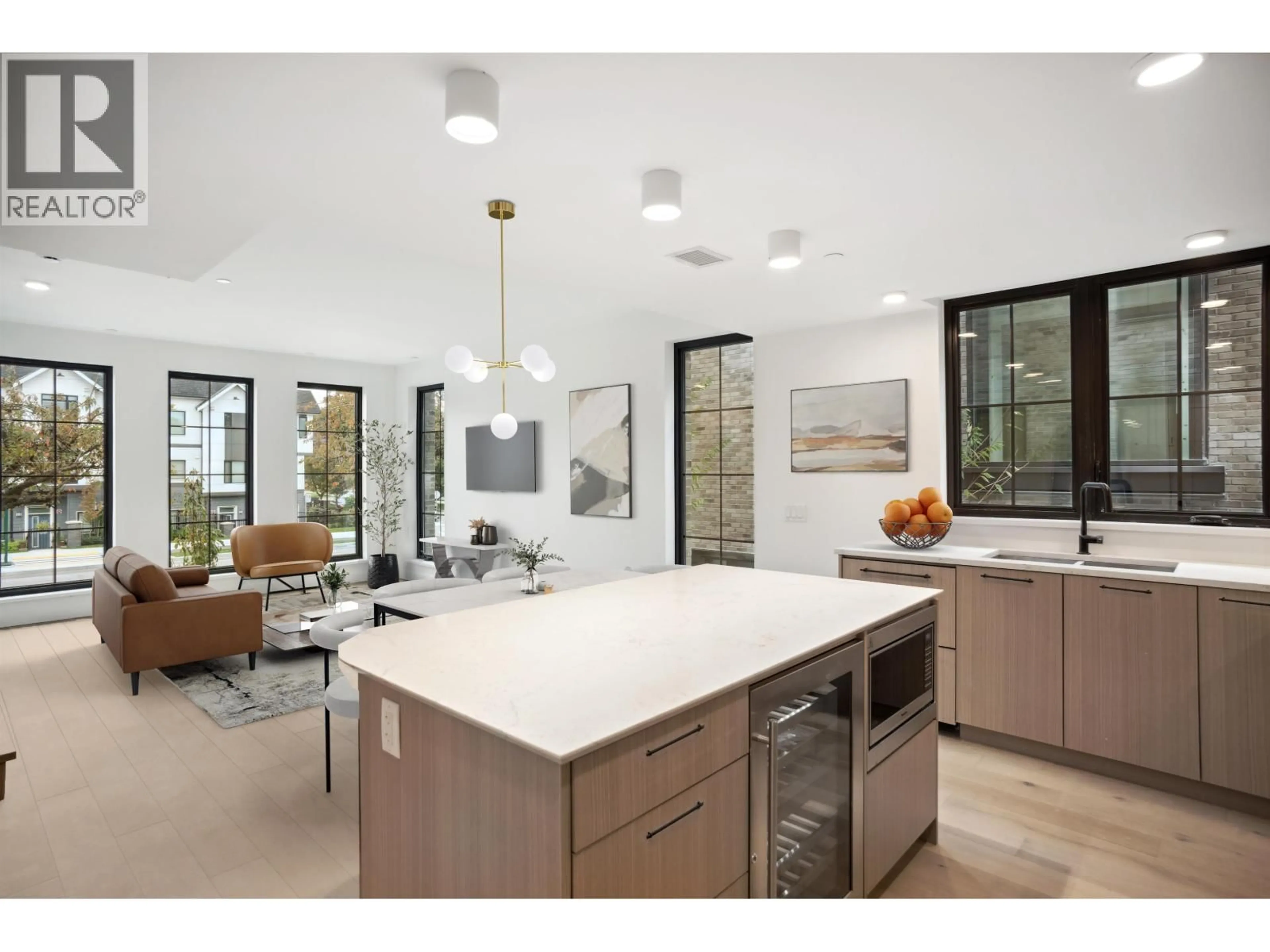 Open concept kitchen, ceramic/tile floor for 104 - 157 KING EDWARD AVENUE, Vancouver British Columbia V5Y2H9