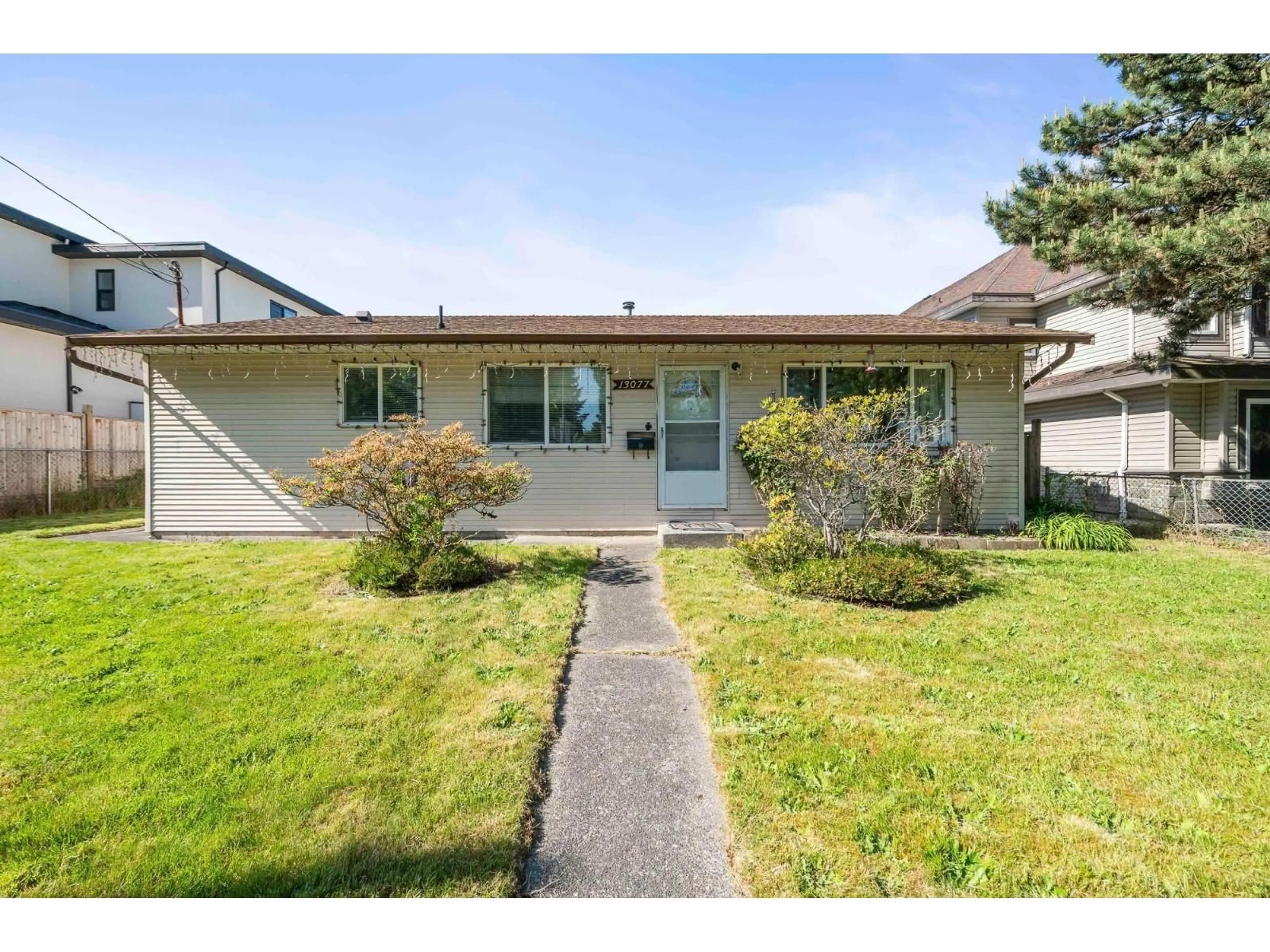 Home with vinyl exterior material, street for 13077 72 AVENUE, Surrey British Columbia V3W2N3