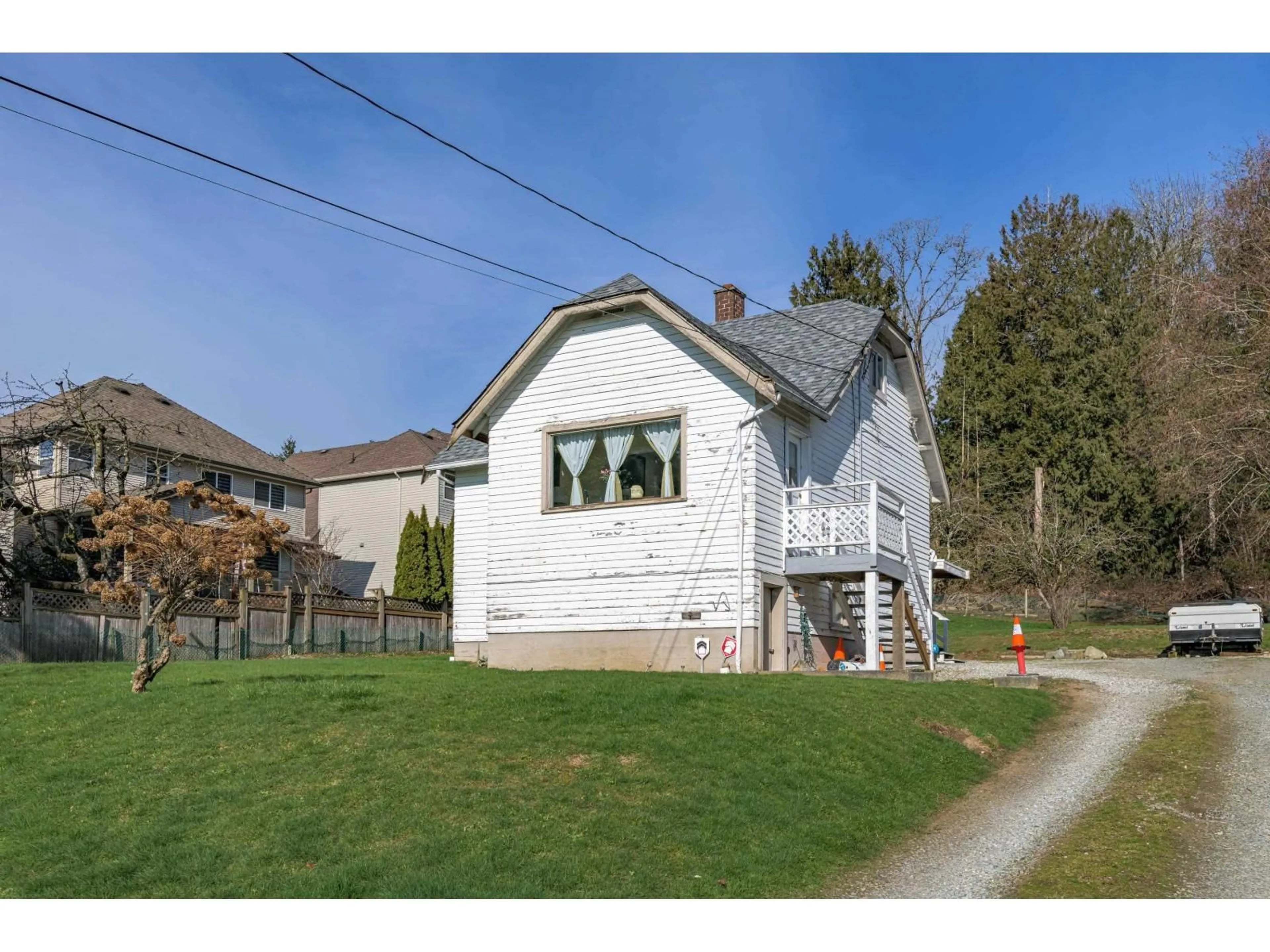 A pic from outside/outdoor area/front of a property/back of a property/a pic from drone, street for 19957 68 AVENUE, Langley British Columbia V2Y2W5