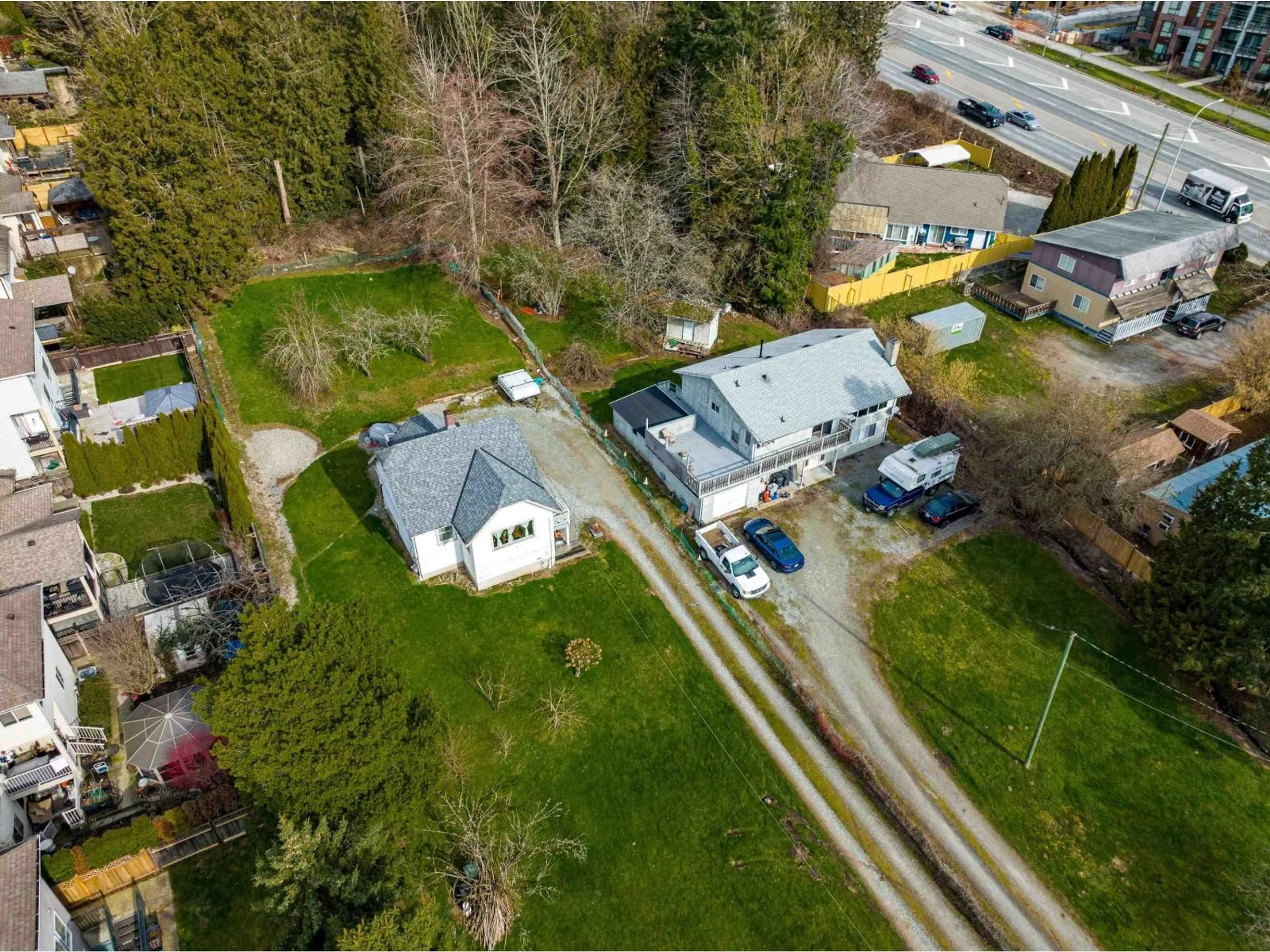 A pic from outside/outdoor area/front of a property/back of a property/a pic from drone, street for 19957 68 AVENUE, Langley British Columbia V2Y2W5