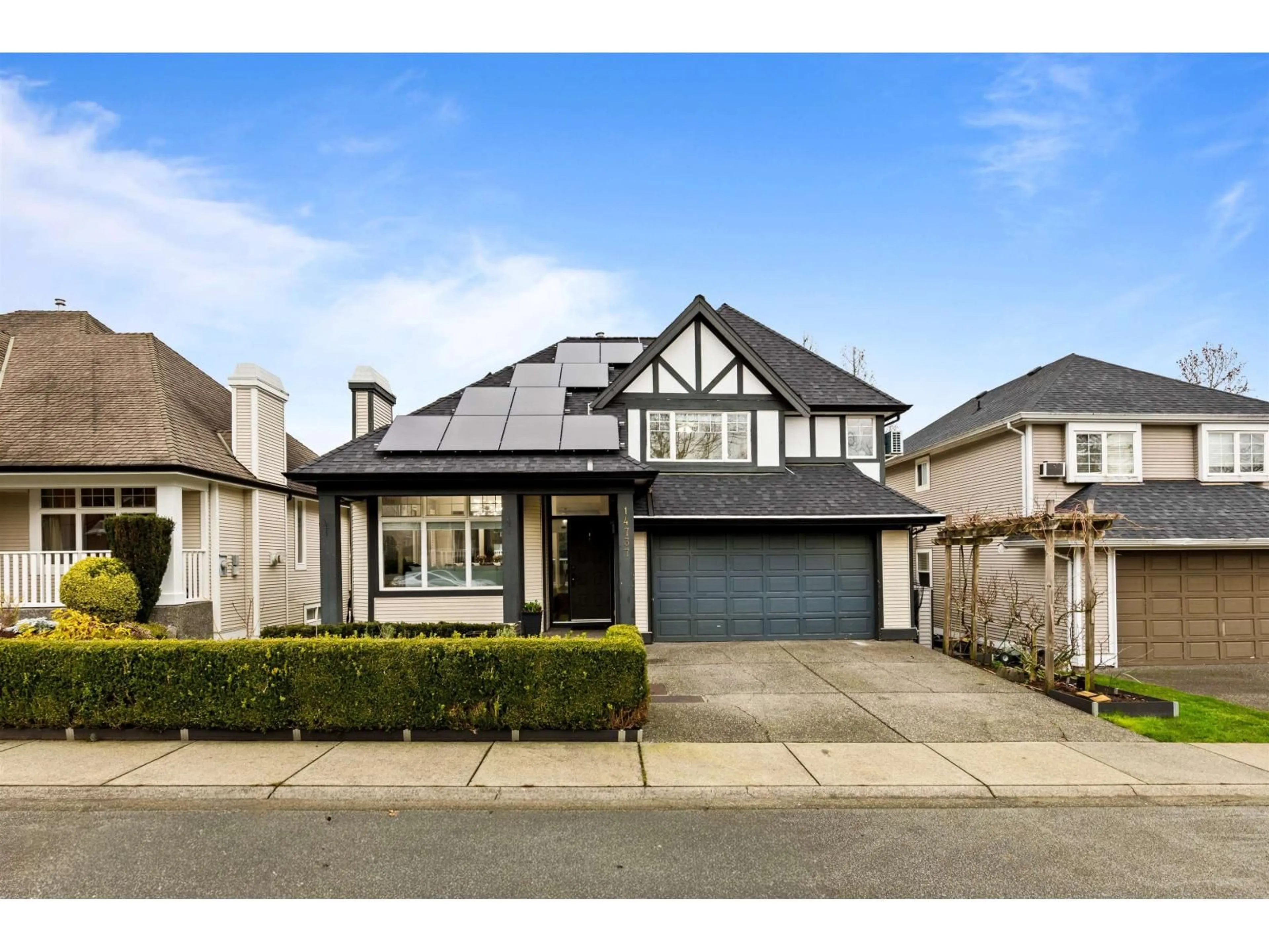 Home with vinyl exterior material, street for 14737 75 AVENUE, Surrey British Columbia V3S8Y6