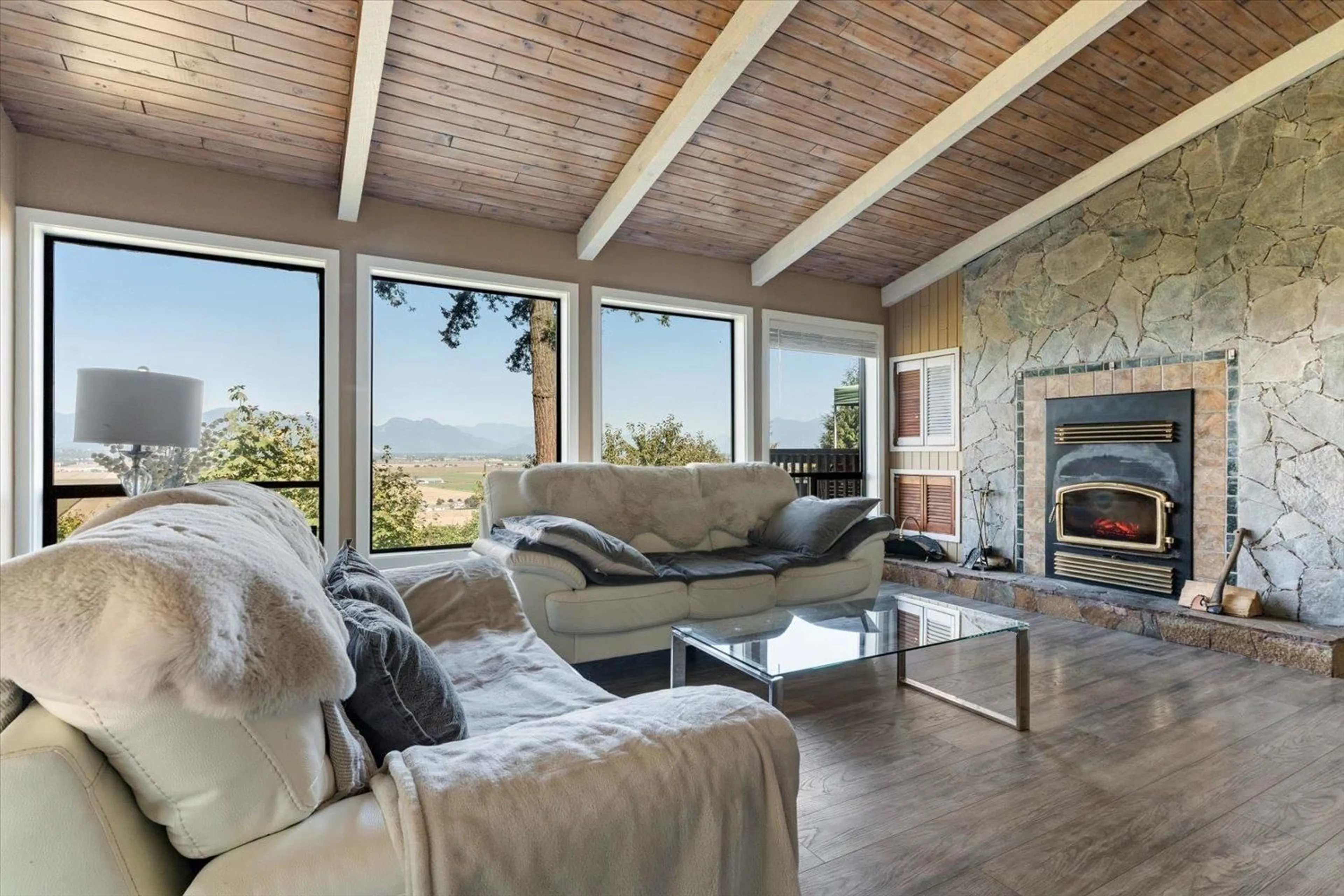 Living room with furniture, wood/laminate floor for 47750 ELK VIEW ROAD, Ryder Lake British Columbia V2R4S5