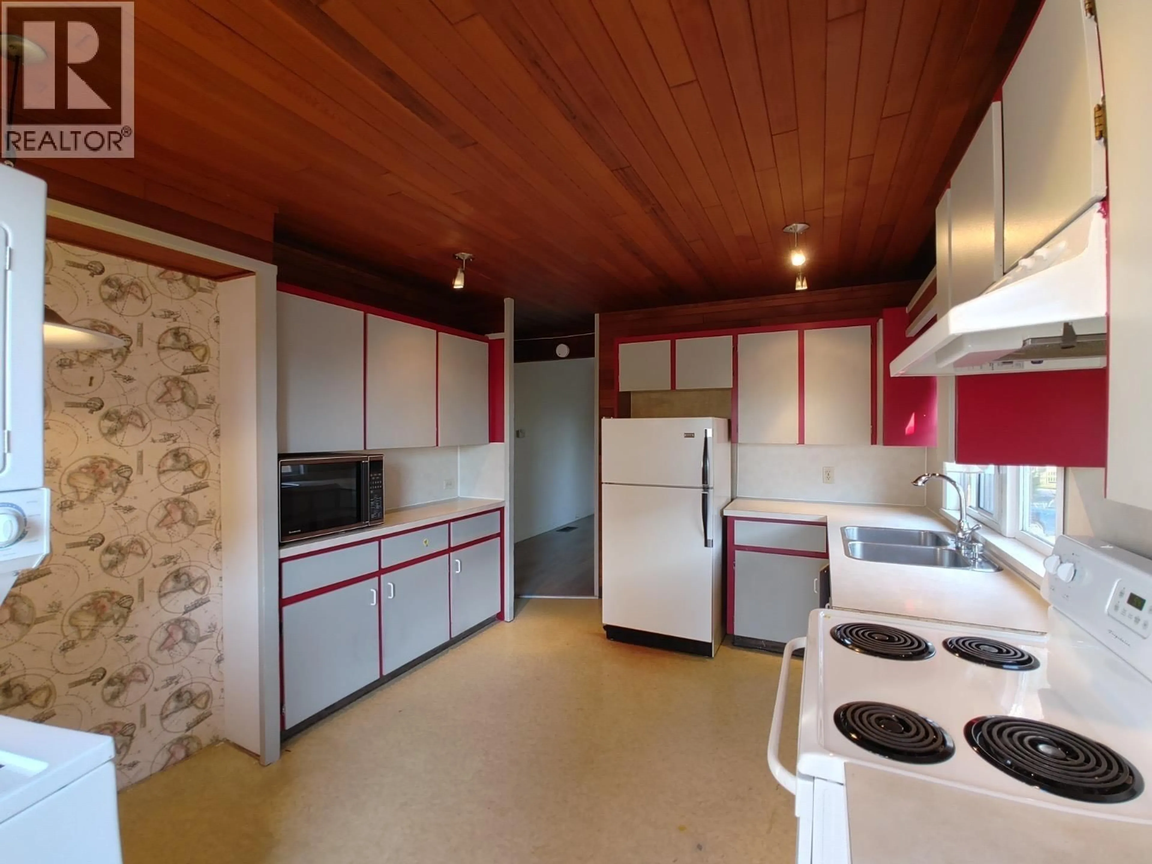 Kitchen with laundary machines, unknown for 5955 JOYCE STREET, Vancouver British Columbia V5R4H9