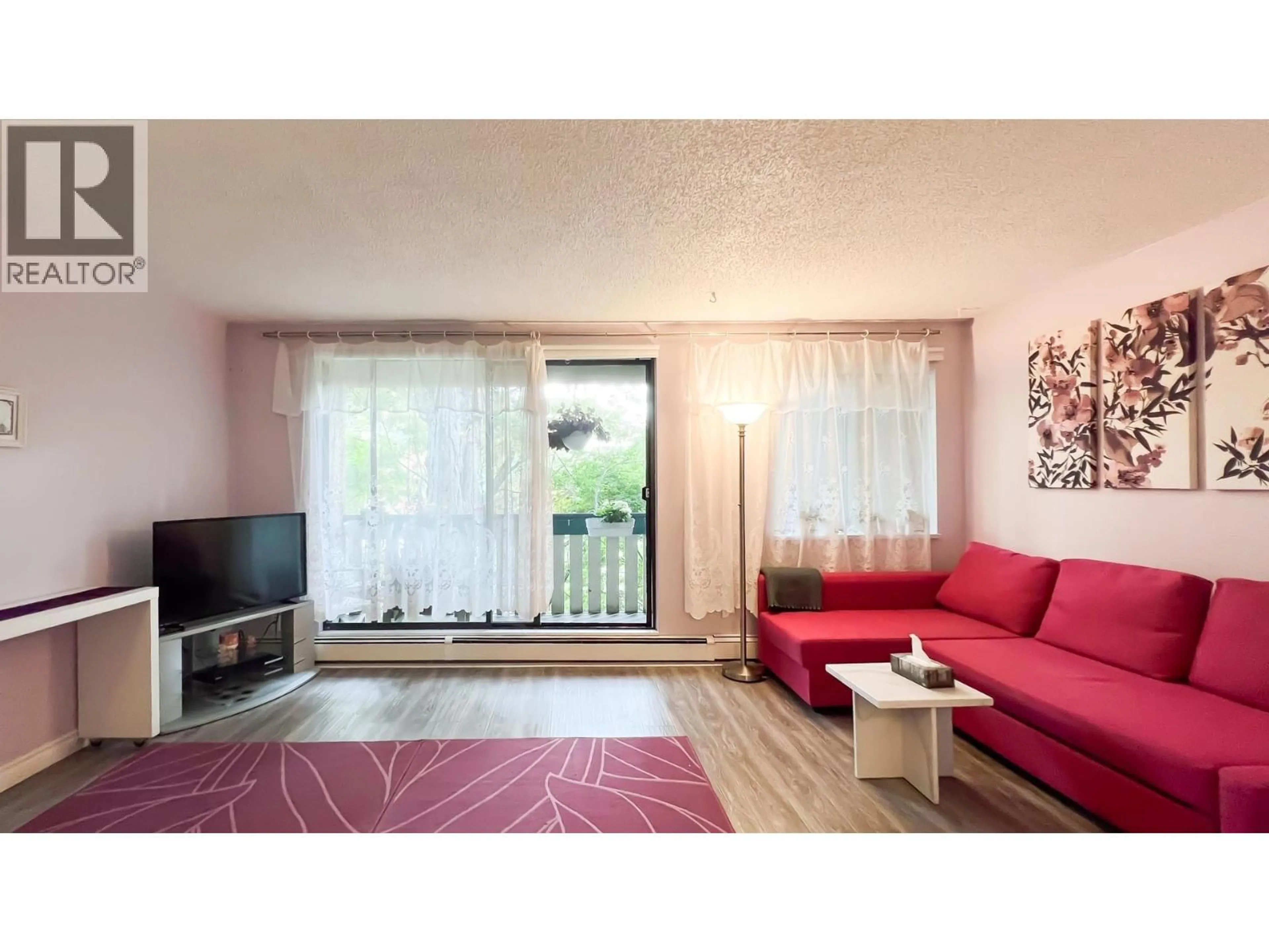 Living room with furniture, wood/laminate floor for 213 - 8540 CITATION DRIVE, Richmond British Columbia V6Y3A3