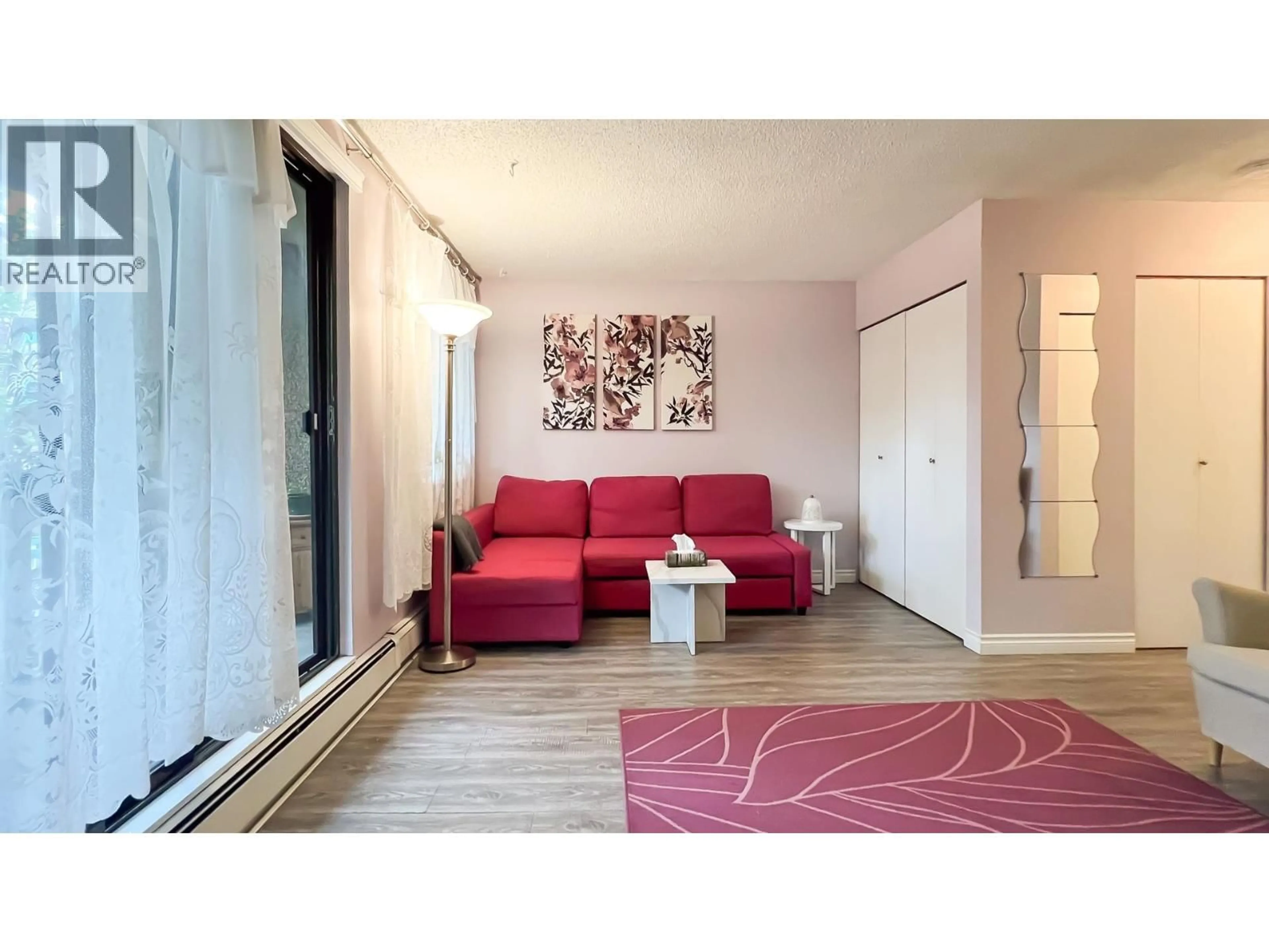 Living room with furniture, wood/laminate floor for 213 - 8540 CITATION DRIVE, Richmond British Columbia V6Y3A3