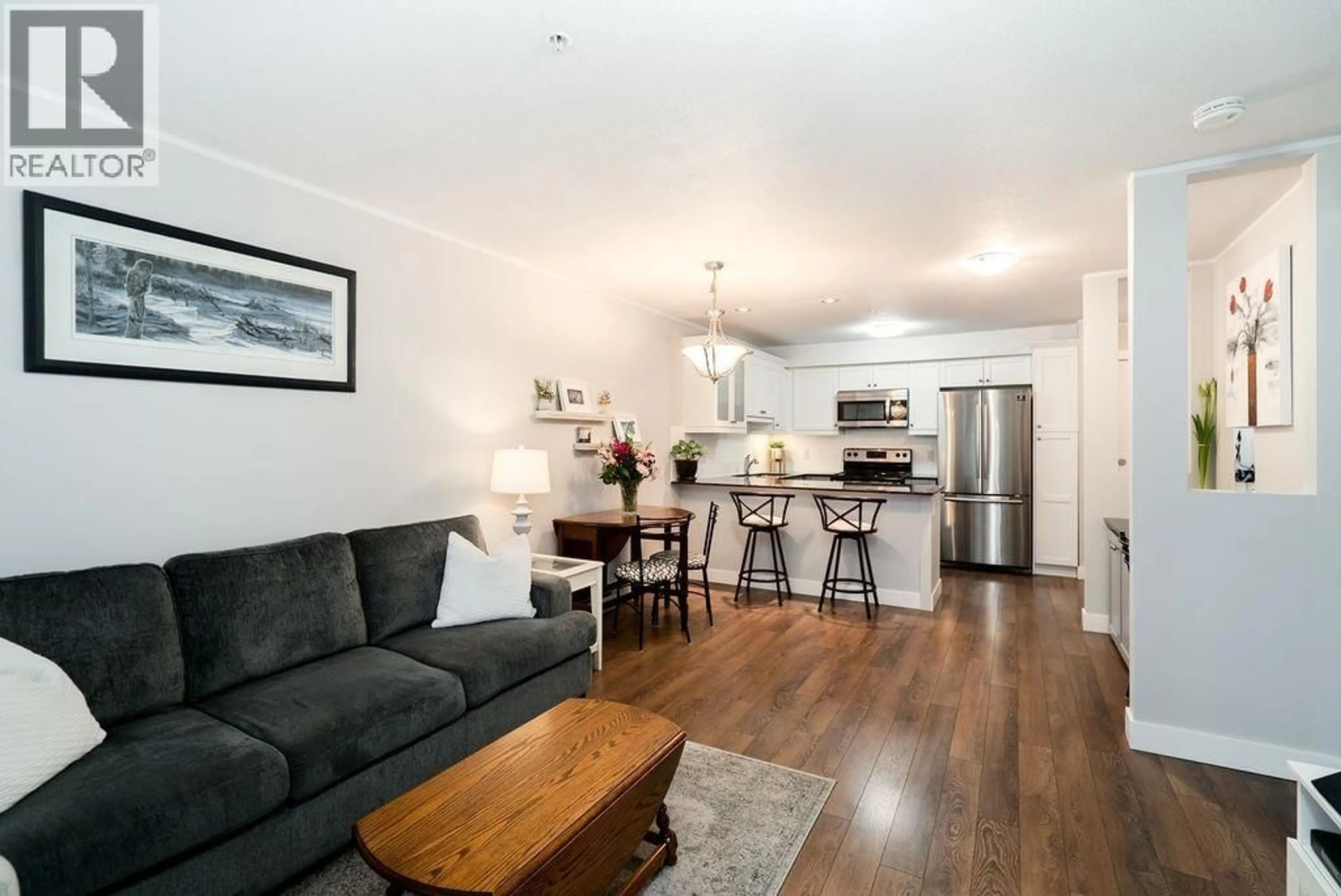 Open concept kitchen, wood/laminate floor for 111 - 1969 WESTMINSTER AVENUE, Port Coquitlam British Columbia V3B1E7
