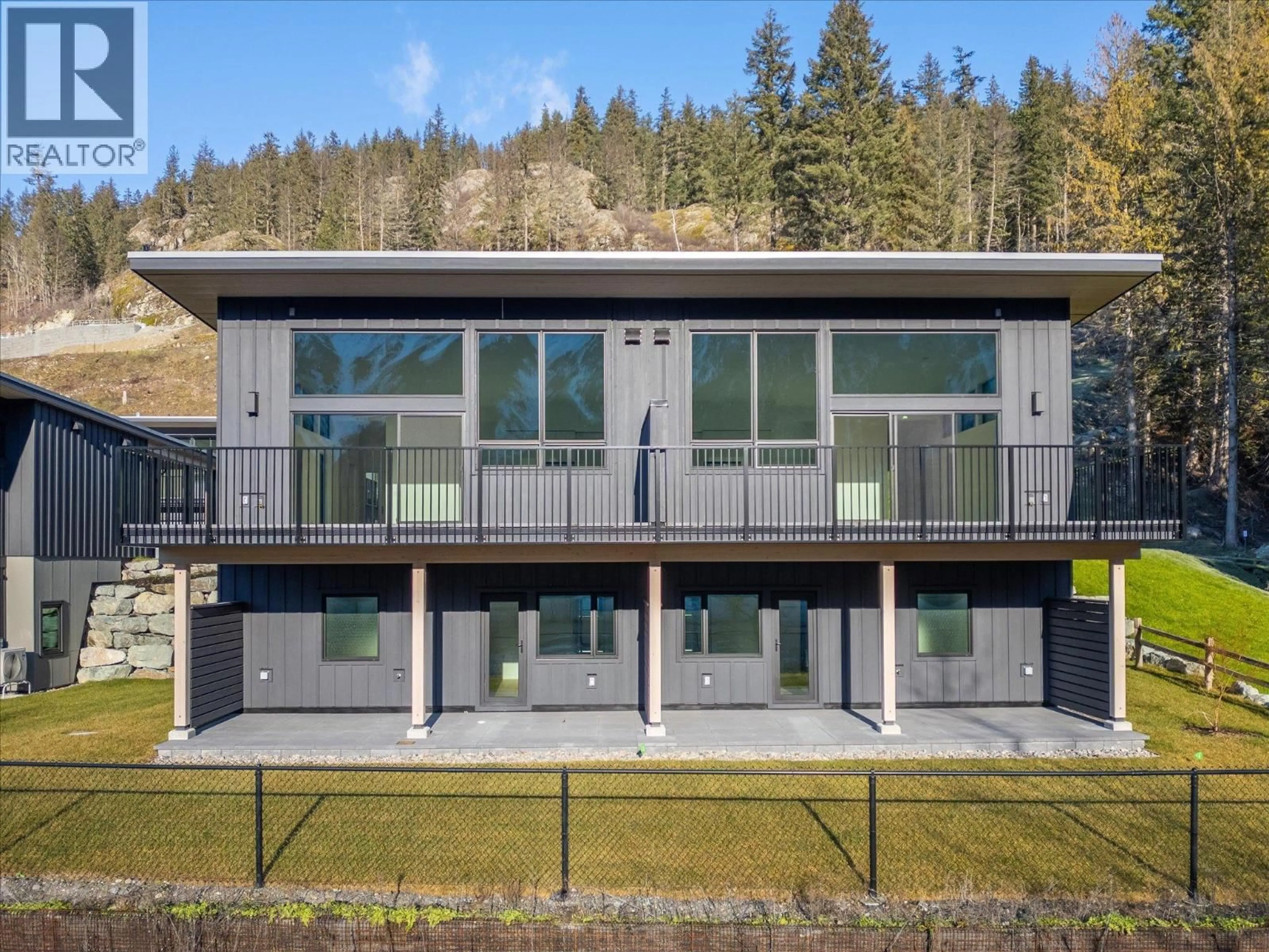 A pic from outside/outdoor area/front of a property/back of a property/a pic from drone, building for 25 - 4000 SUNSTONE WAY, Pemberton British Columbia V0N2L3