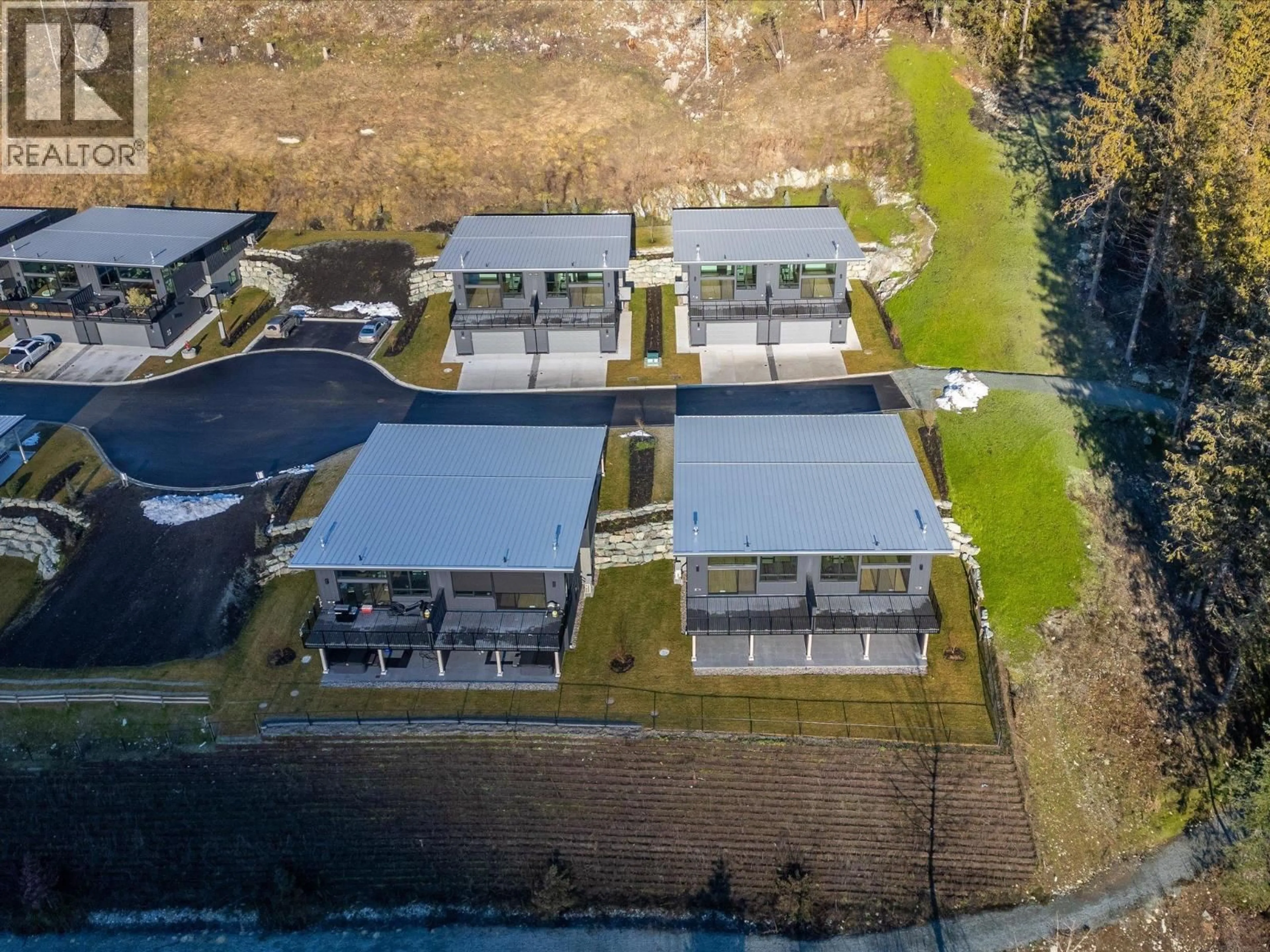 A pic from outside/outdoor area/front of a property/back of a property/a pic from drone, water/lake/river/ocean view for 25 - 4000 SUNSTONE WAY, Pemberton British Columbia V0N2L3