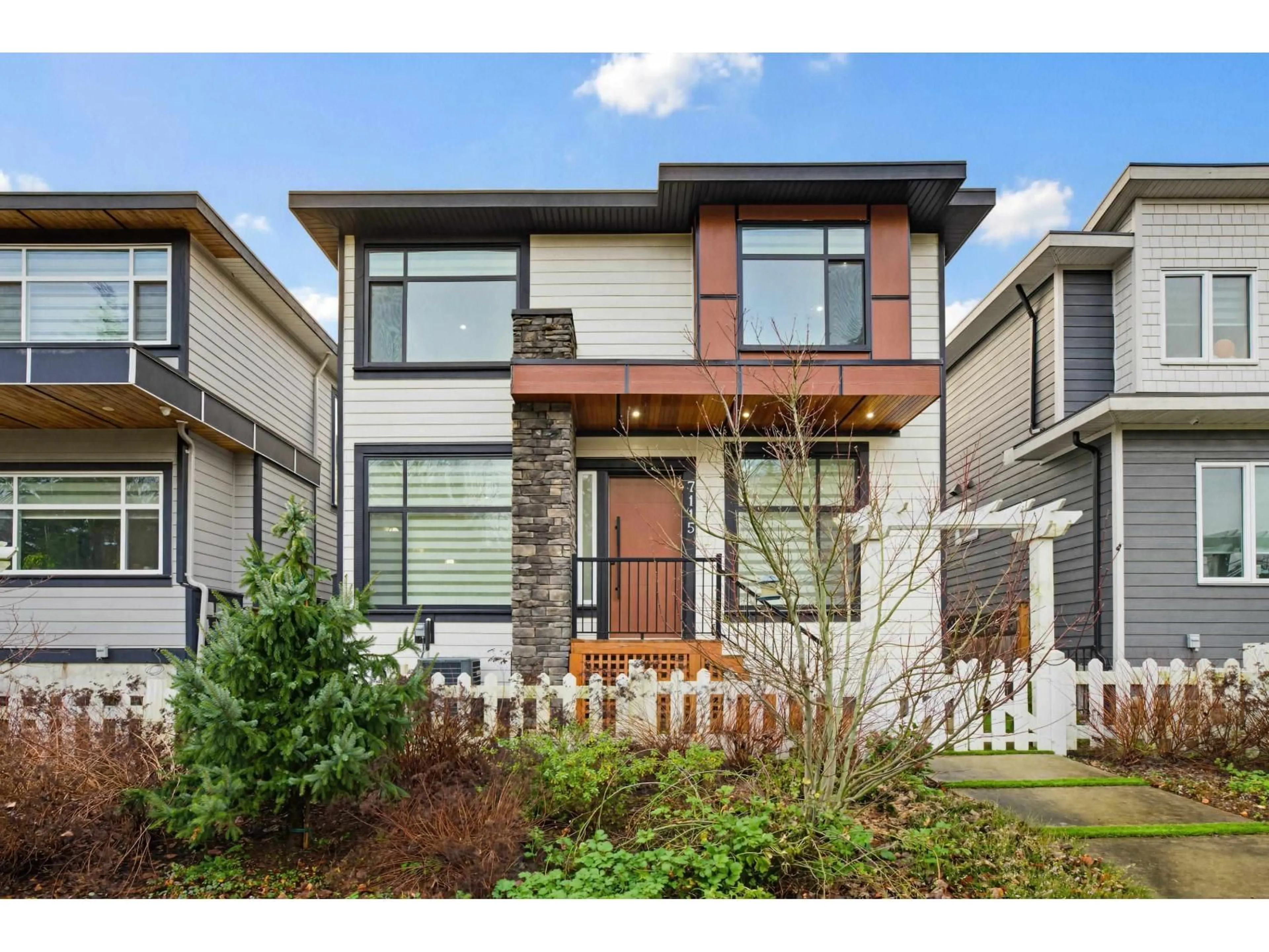 Home with brick exterior material, street for 7115 206 STREET, Langley British Columbia V2Y3J9