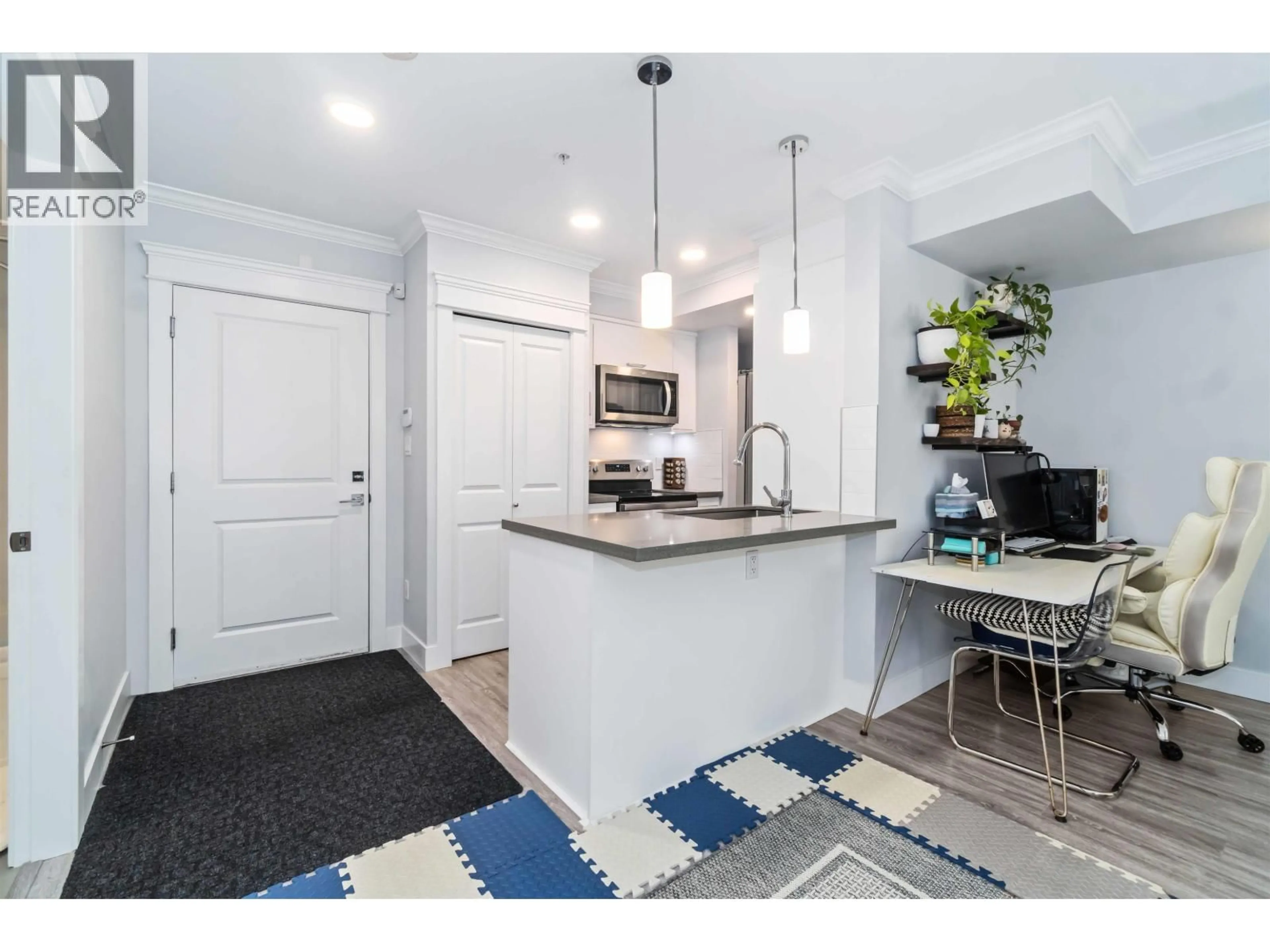 Open concept kitchen, ceramic/tile floor for 104 - 2229 ATKINS AVENUE, Port Coquitlam British Columbia V3C1Y5