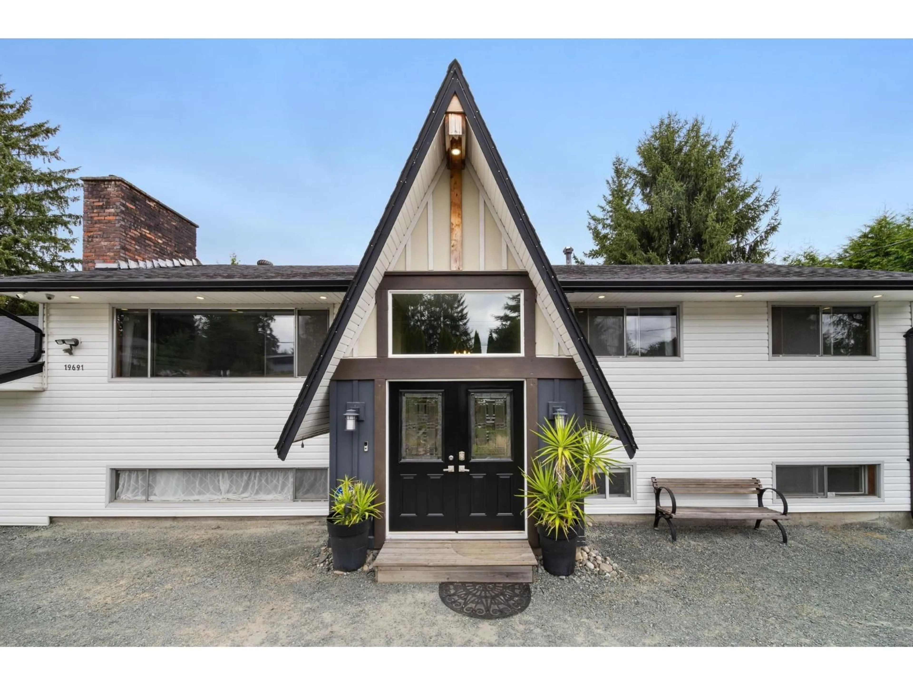 Home with brick exterior material, unknown for 19691 49 AVENUE, Langley British Columbia V3A3R2