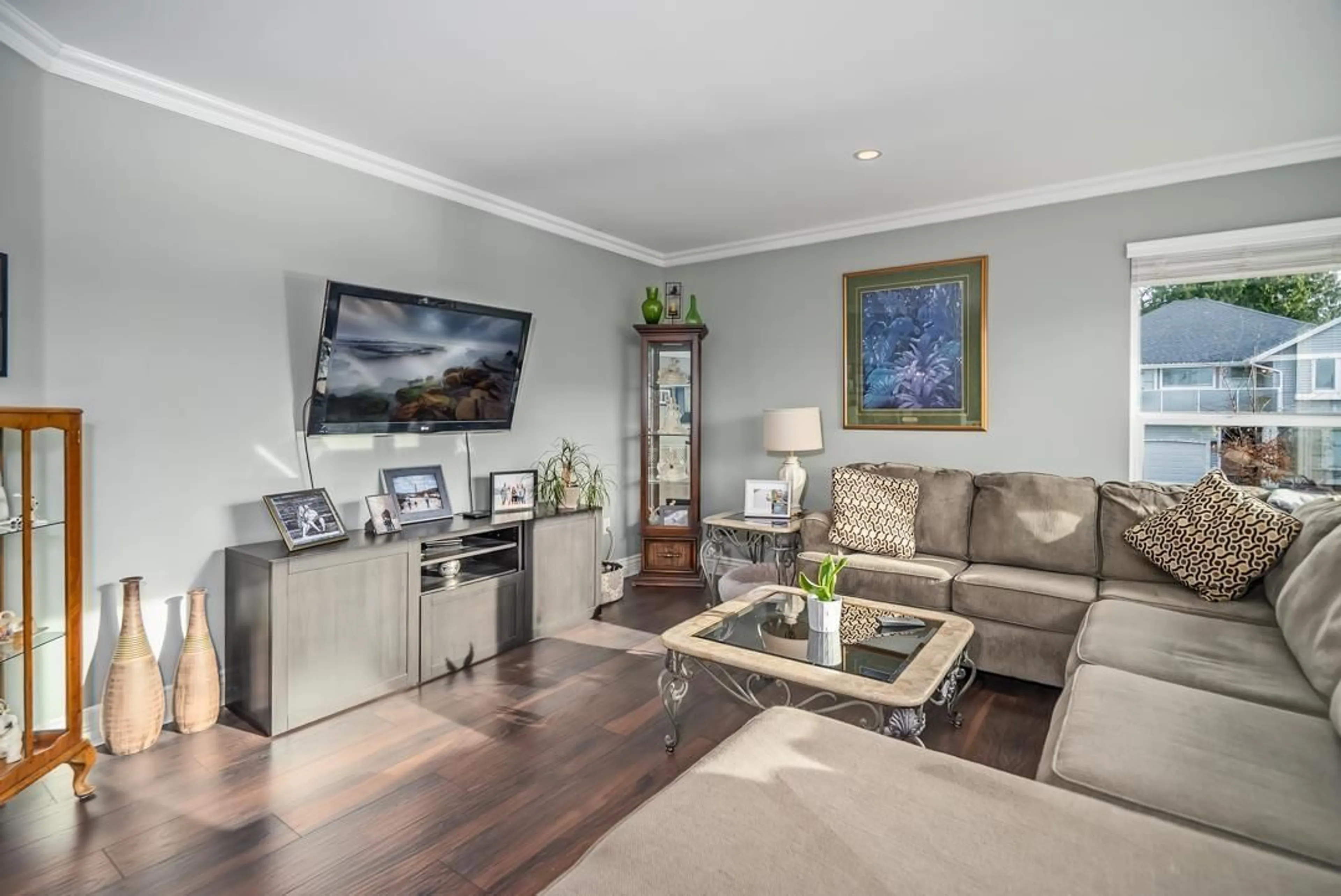 Living room with furniture, wood/laminate floor for 8247 BOWYER DRIVE, Mission British Columbia V2V6V9