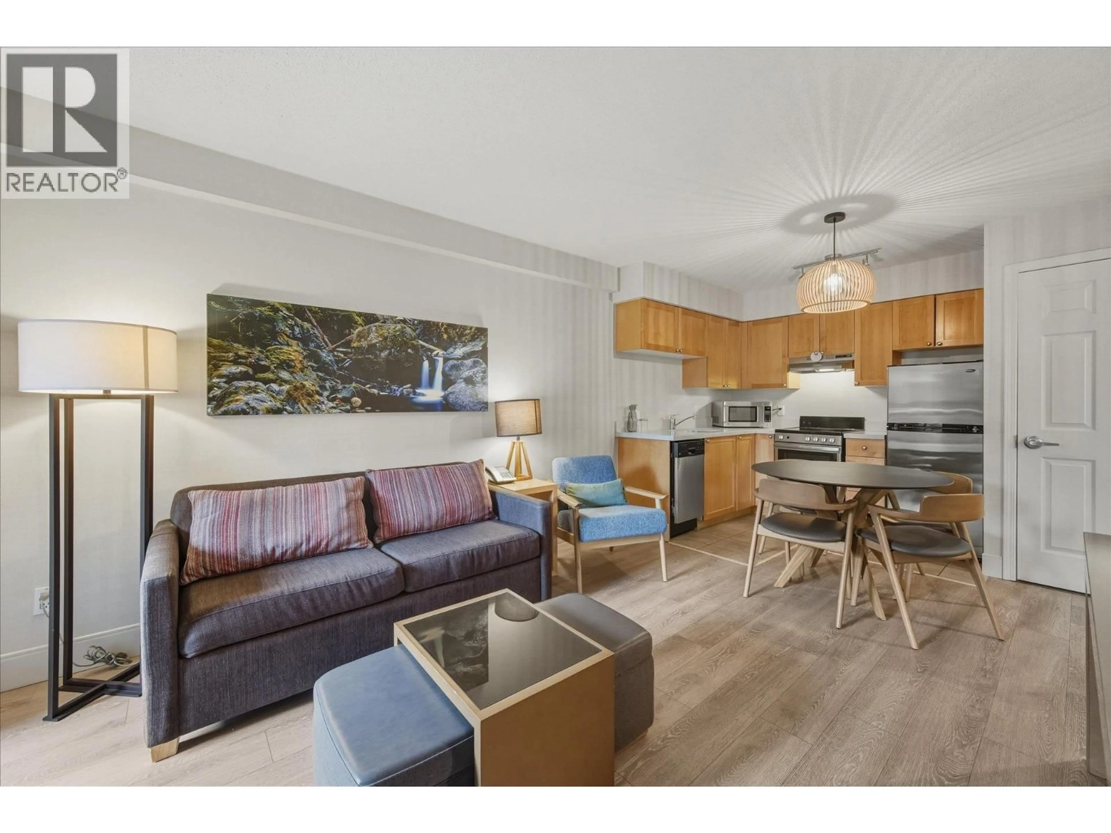 Living room with furniture, wood/laminate floor for 1409 - 4308 MAIN STREET, Whistler British Columbia V8E1A9