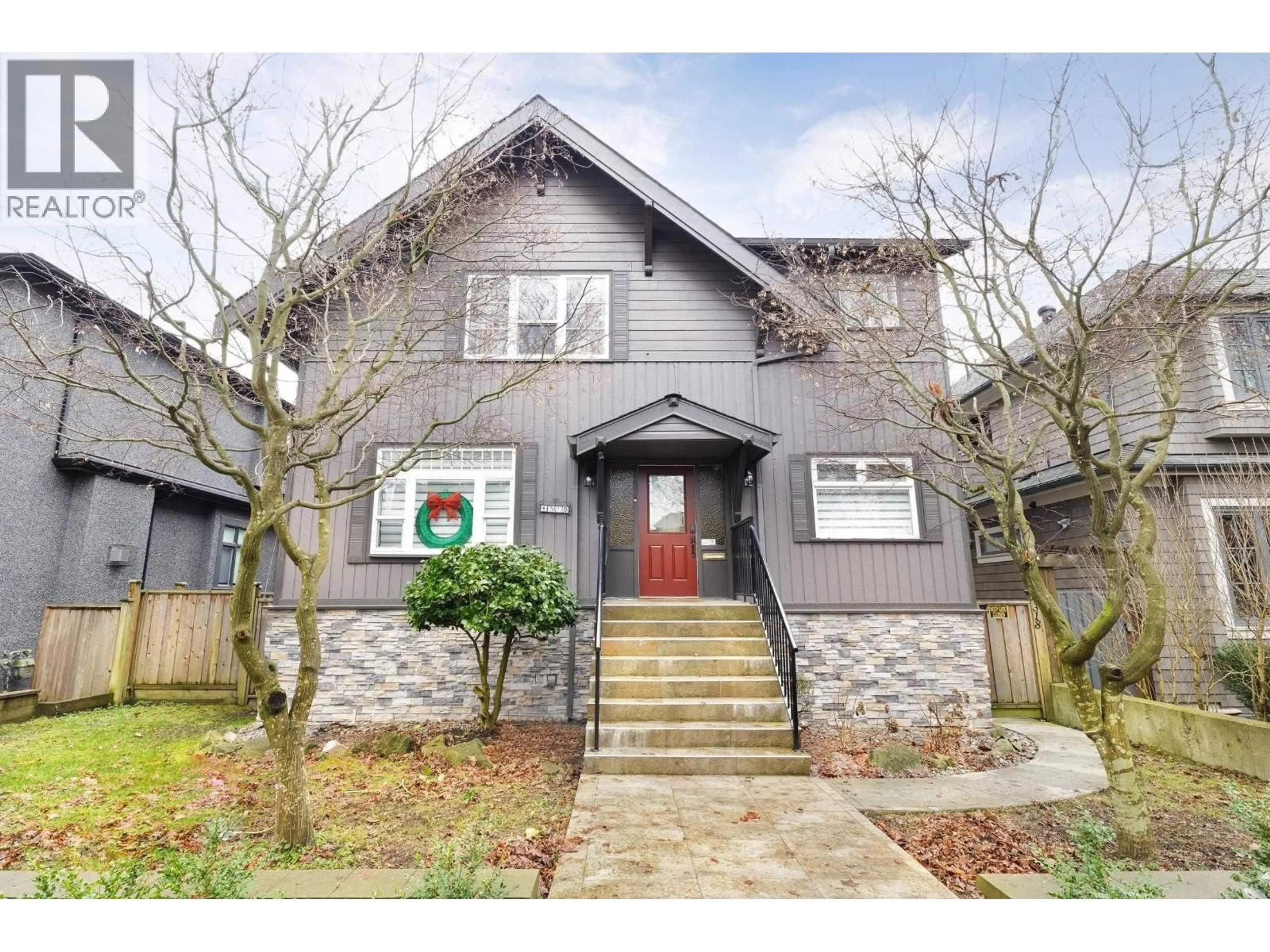Home with brick exterior material, street for 4318 11TH AVENUE, Vancouver British Columbia V6R2M1