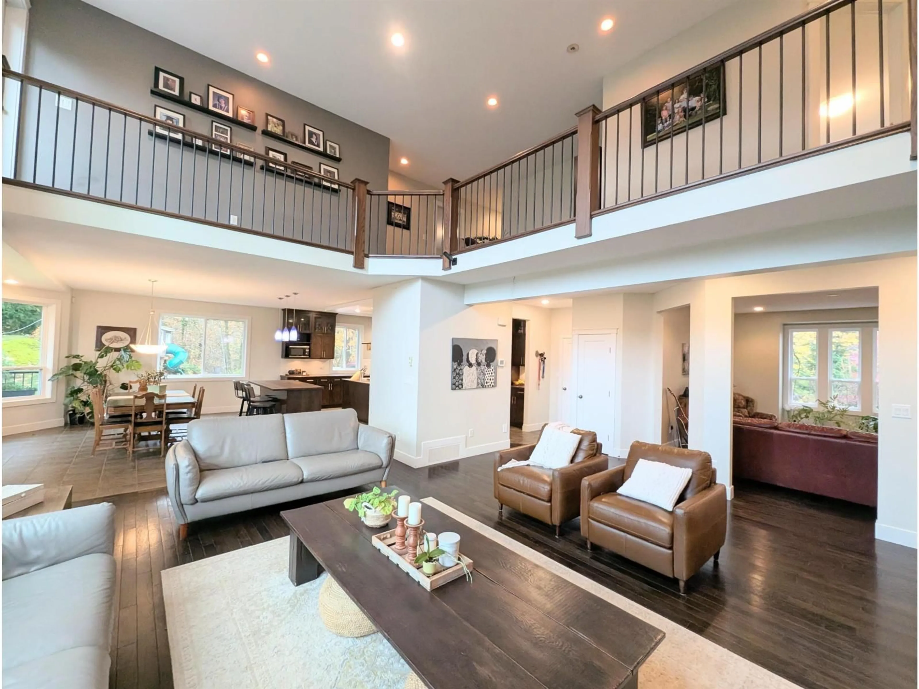 Living room with furniture, wood/laminate floor for 43350 HILLKEEP PLACE, Chilliwack British Columbia V2R4A4