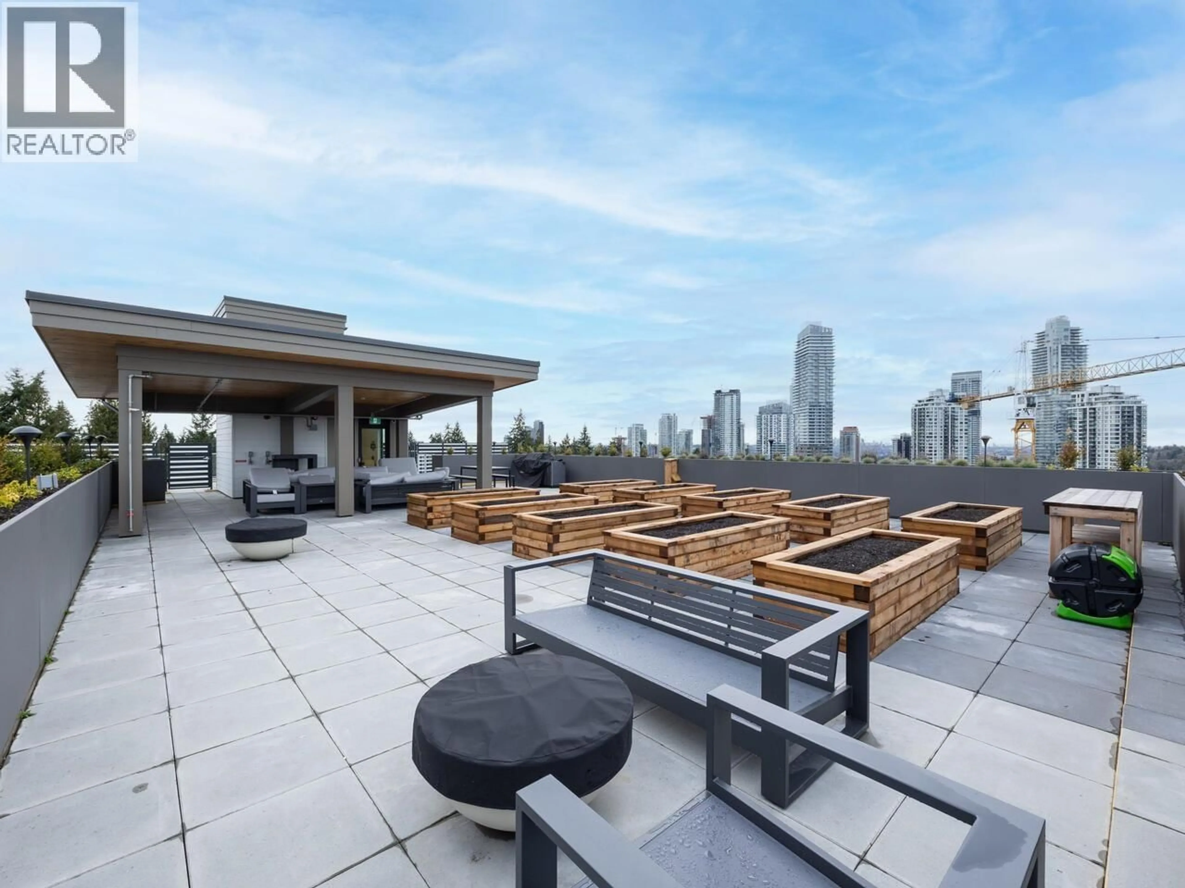 Patio, city buildings view from balcony for 105 - 723 GROVER AVENUE, Coquitlam British Columbia V3J0L9