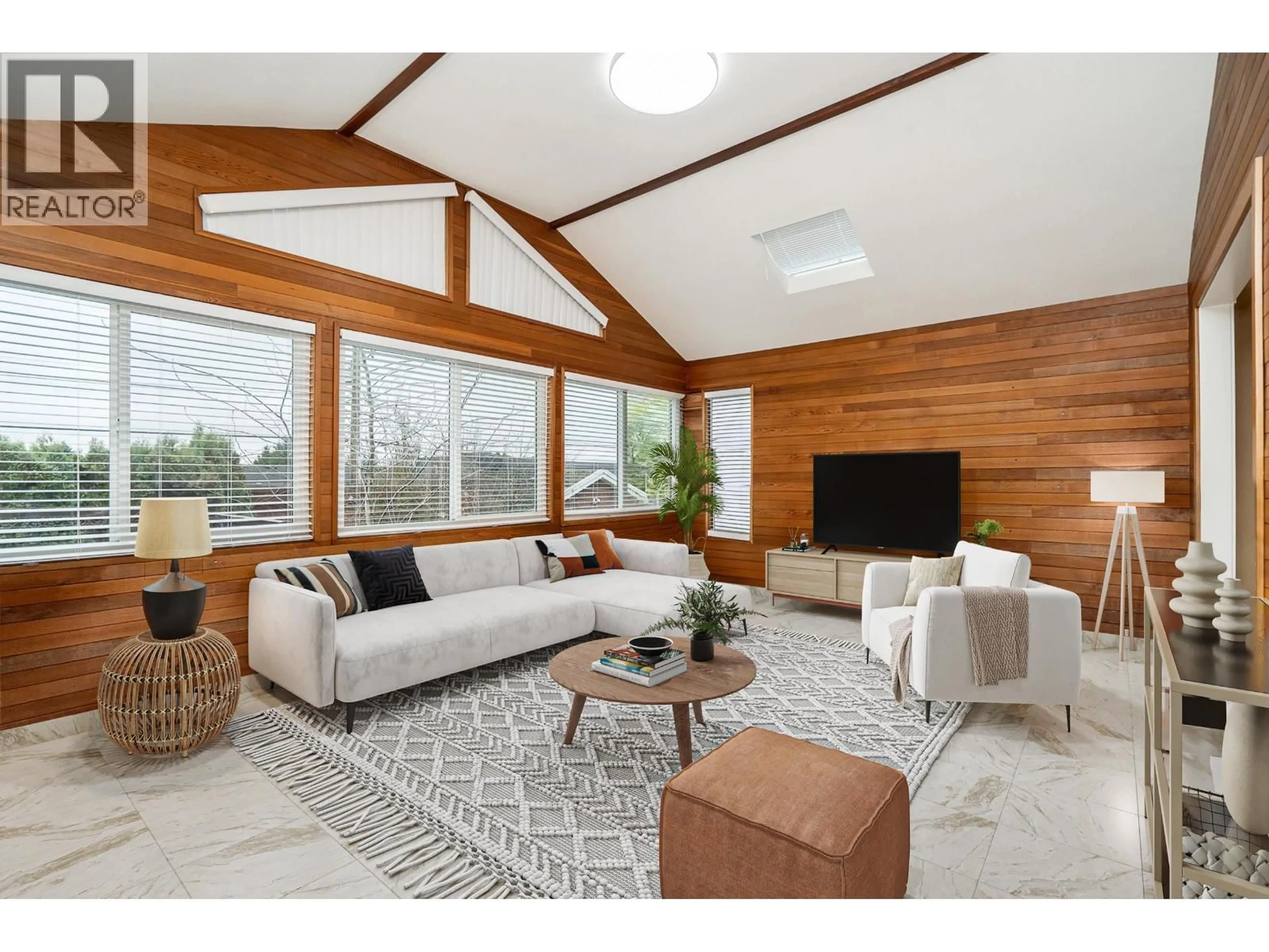 Living room with furniture, wood/laminate floor for 6560 WINCH STREET, Burnaby British Columbia V5B2L6