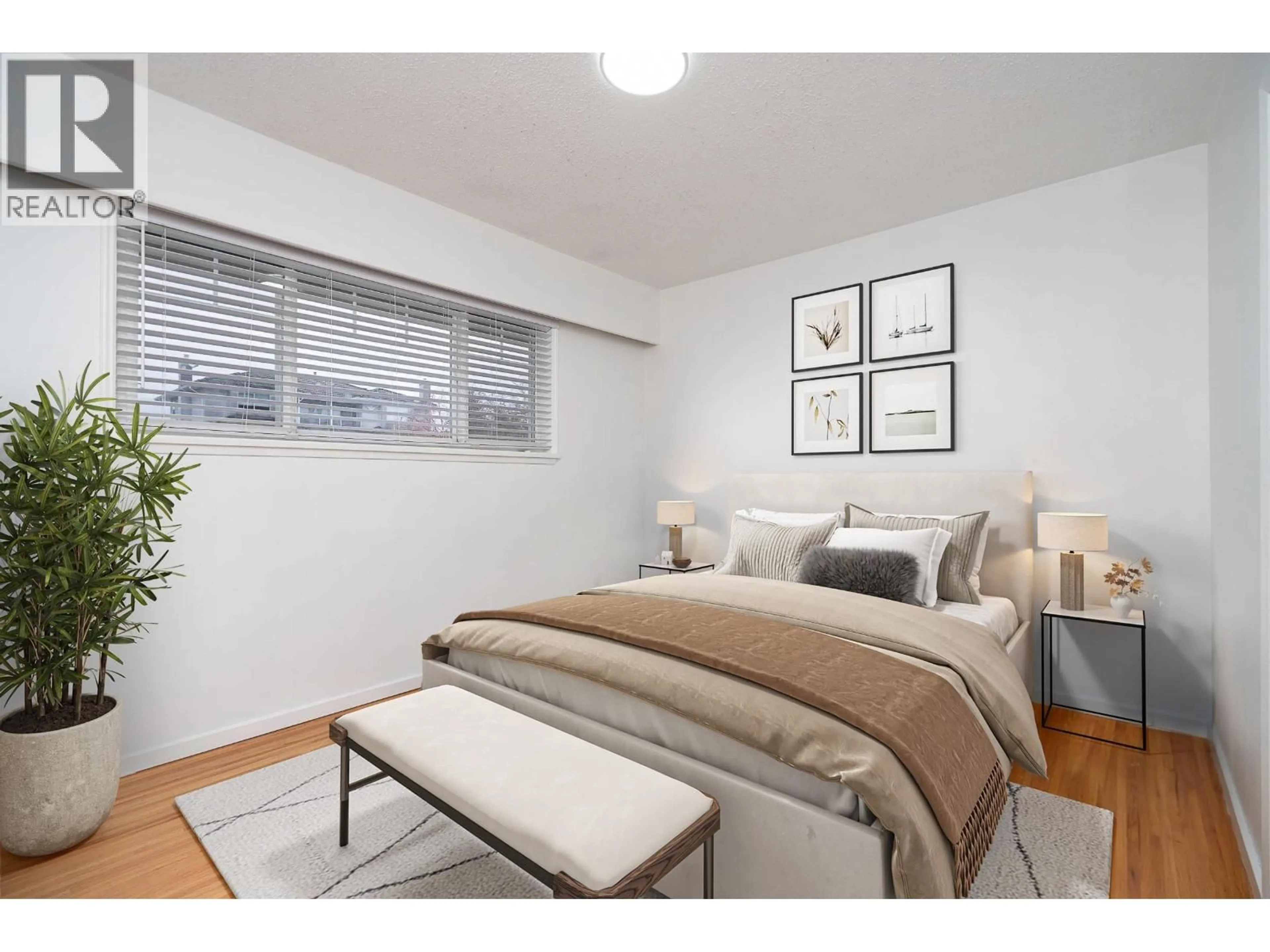 Bedroom with bed, wood/laminate floor for 6560 WINCH STREET, Burnaby British Columbia V5B2L6