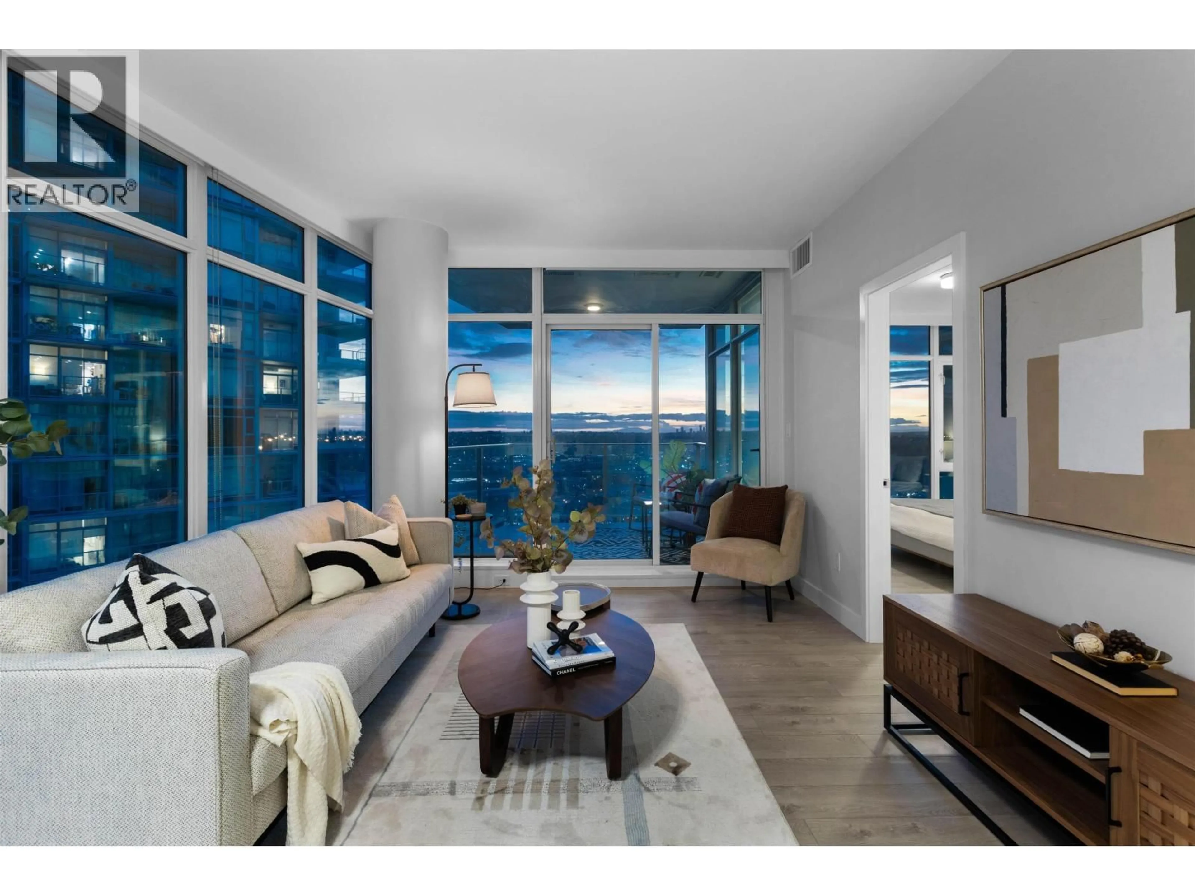 Living room with furniture, wood/laminate floor for 2402 - 1788 GILMORE AVENUE, Burnaby British Columbia V5C0L5