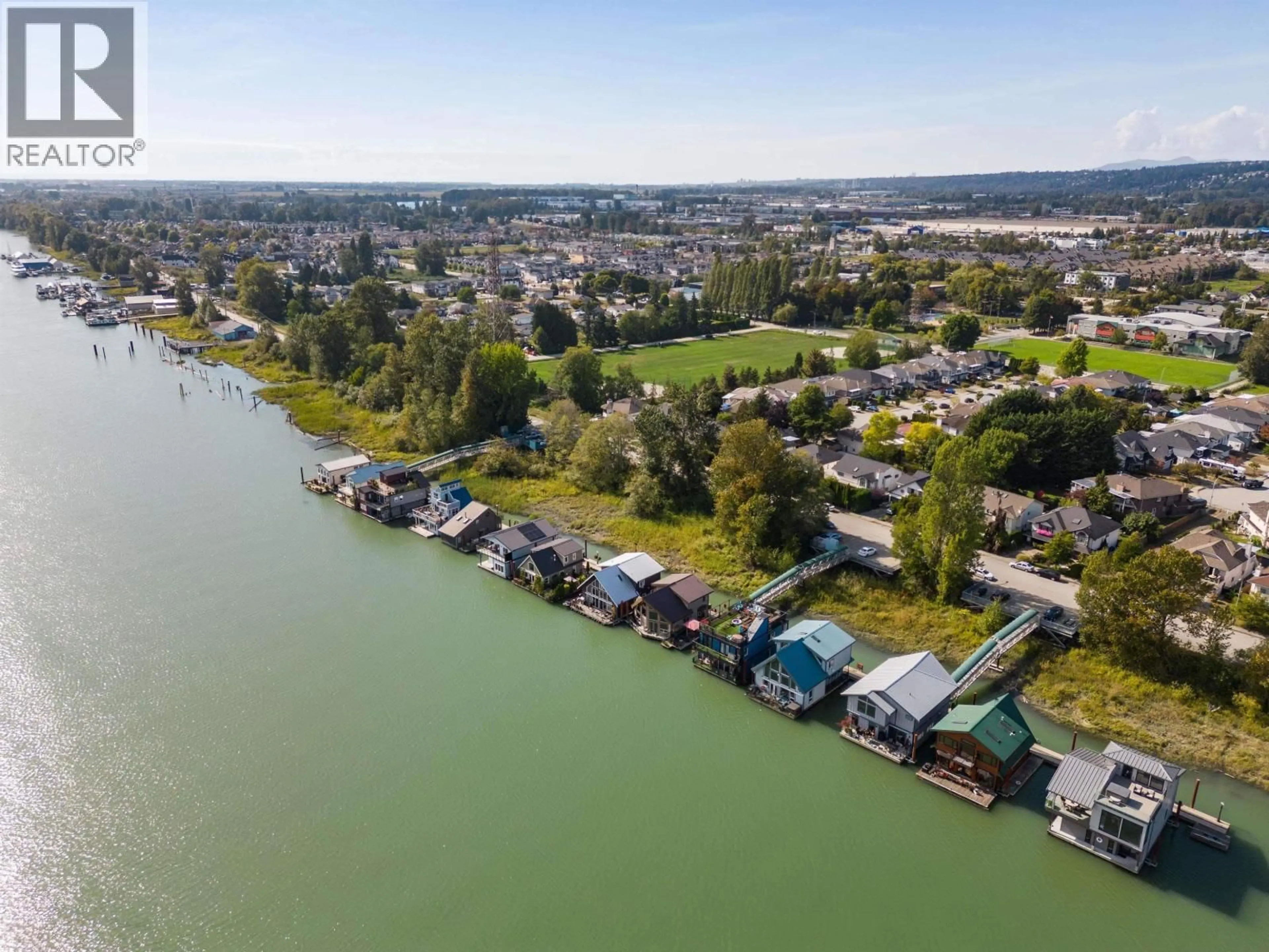 A pic from outside/outdoor area/front of a property/back of a property/a pic from drone, water/lake/river/ocean view for 4 - 800 SOUTH DYKE ROAD, New Westminster British Columbia V3M4Z8