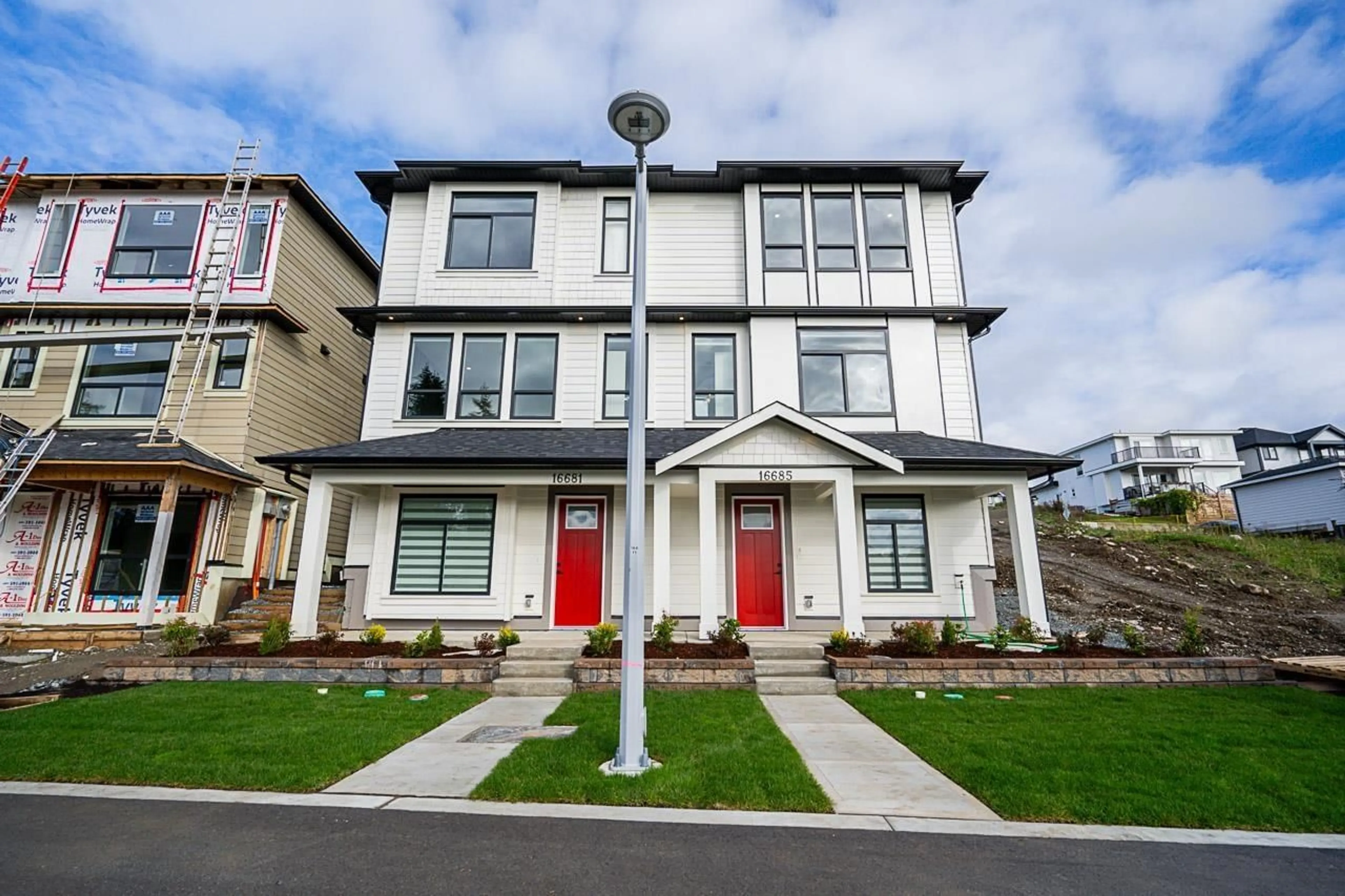 Home with vinyl exterior material, street for 16685 16 AVENUE, Surrey British Columbia V3S9X7