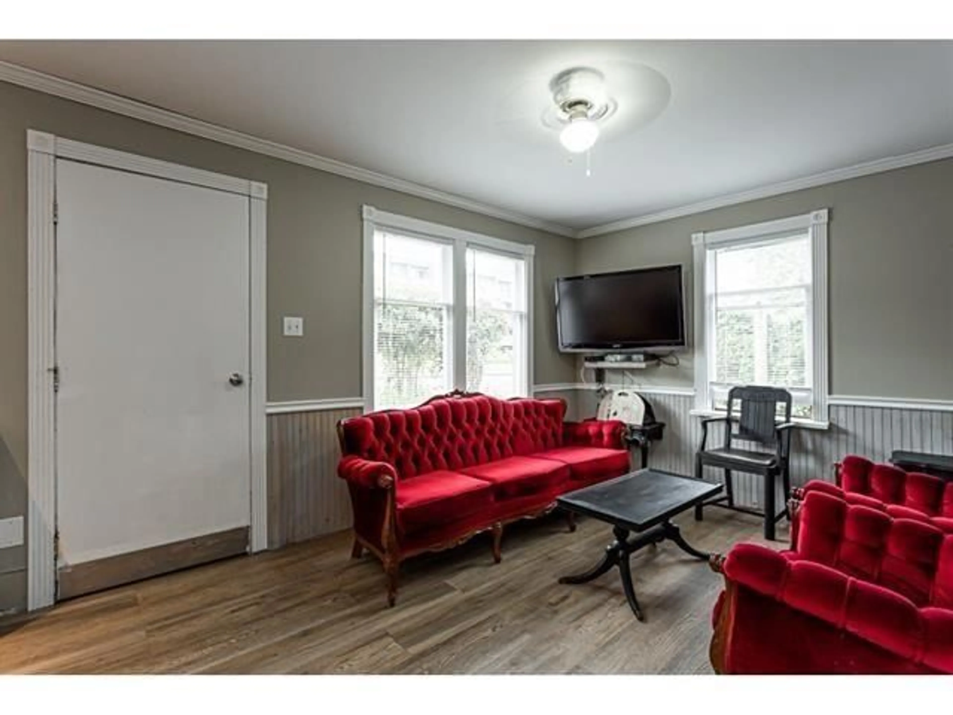 Living room with furniture, wood/laminate floor for 5881 176A STREET, Surrey British Columbia V3S4H6