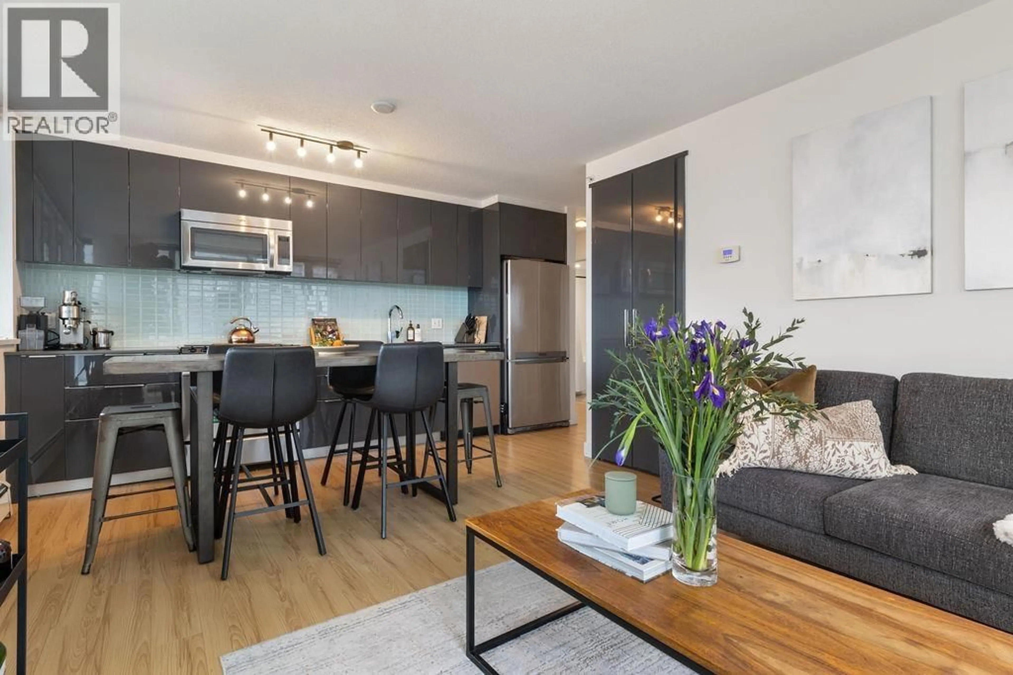 Open concept kitchen, wood/laminate floor for 609 - 1325 ROLSTON STREET, Vancouver British Columbia V6B0M2