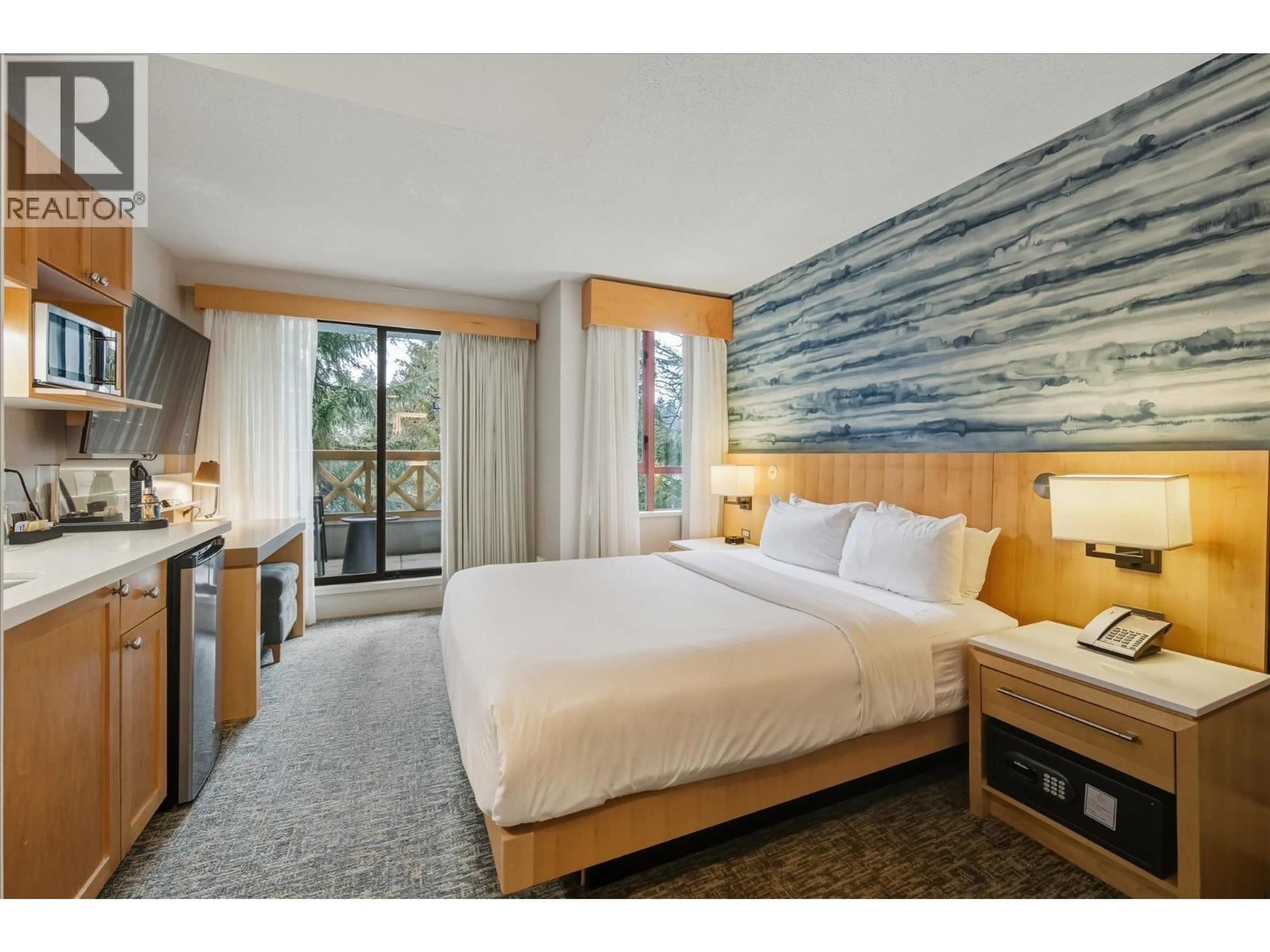 Bedroom with bed, wood/laminate floor for 1266 - 4308 MAIN STREET, Whistler British Columbia V8E1A9