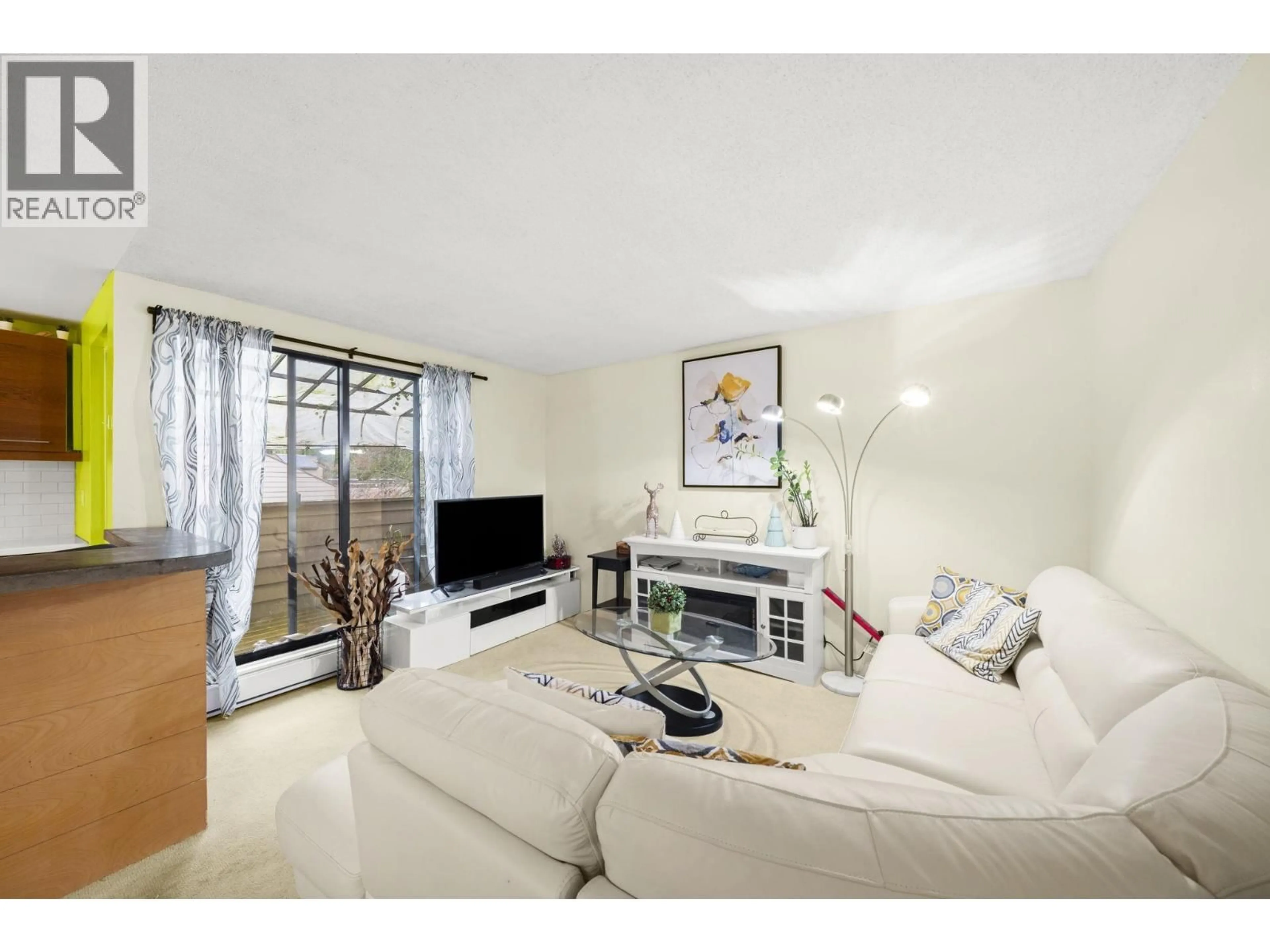 Living room with furniture, unknown for 201 - 9145 SATURNA DRIVE, Burnaby British Columbia V3J7K1