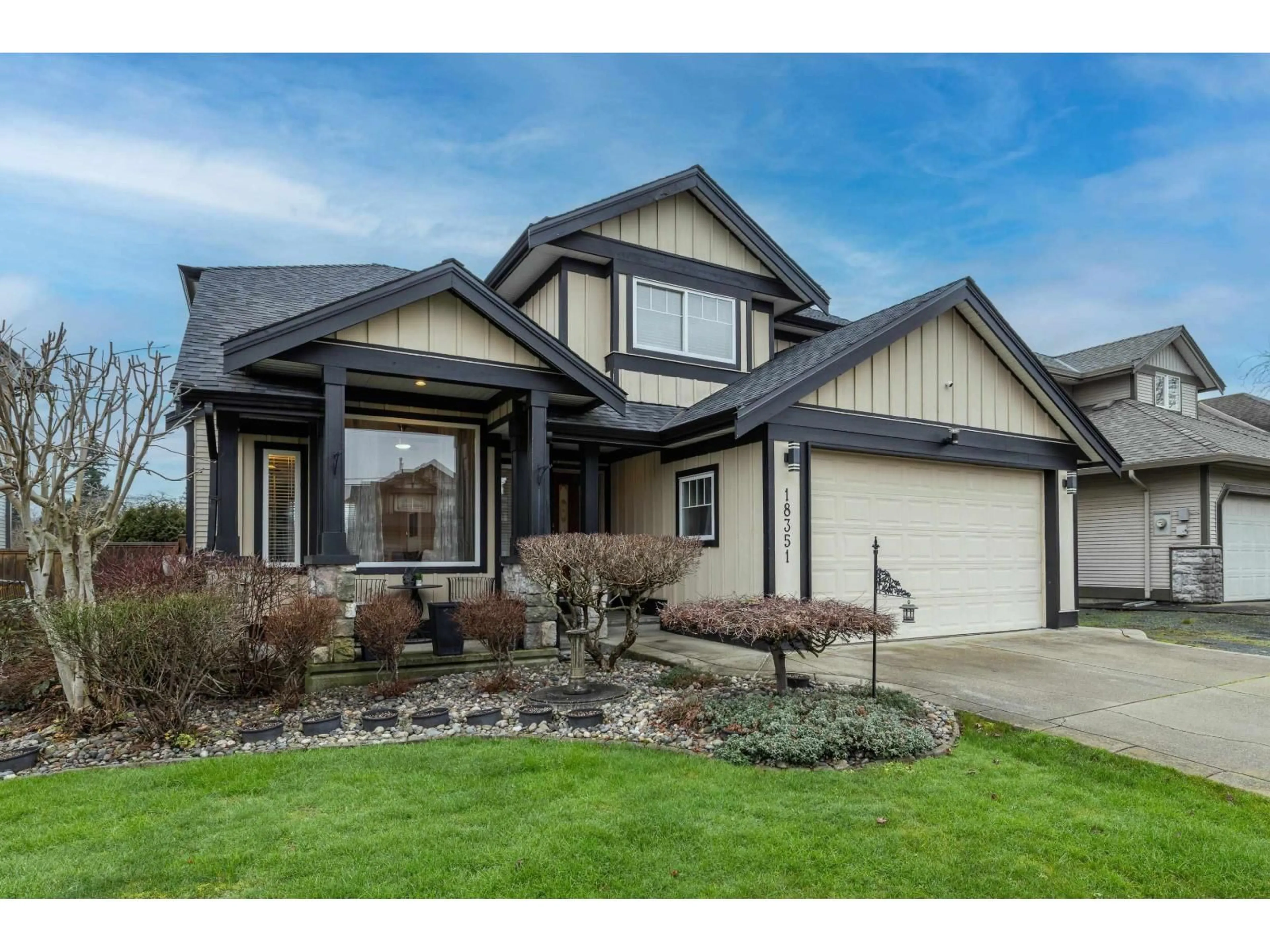 Home with vinyl exterior material, street for 18351 68 AVENUE, Surrey British Columbia V3S9C6