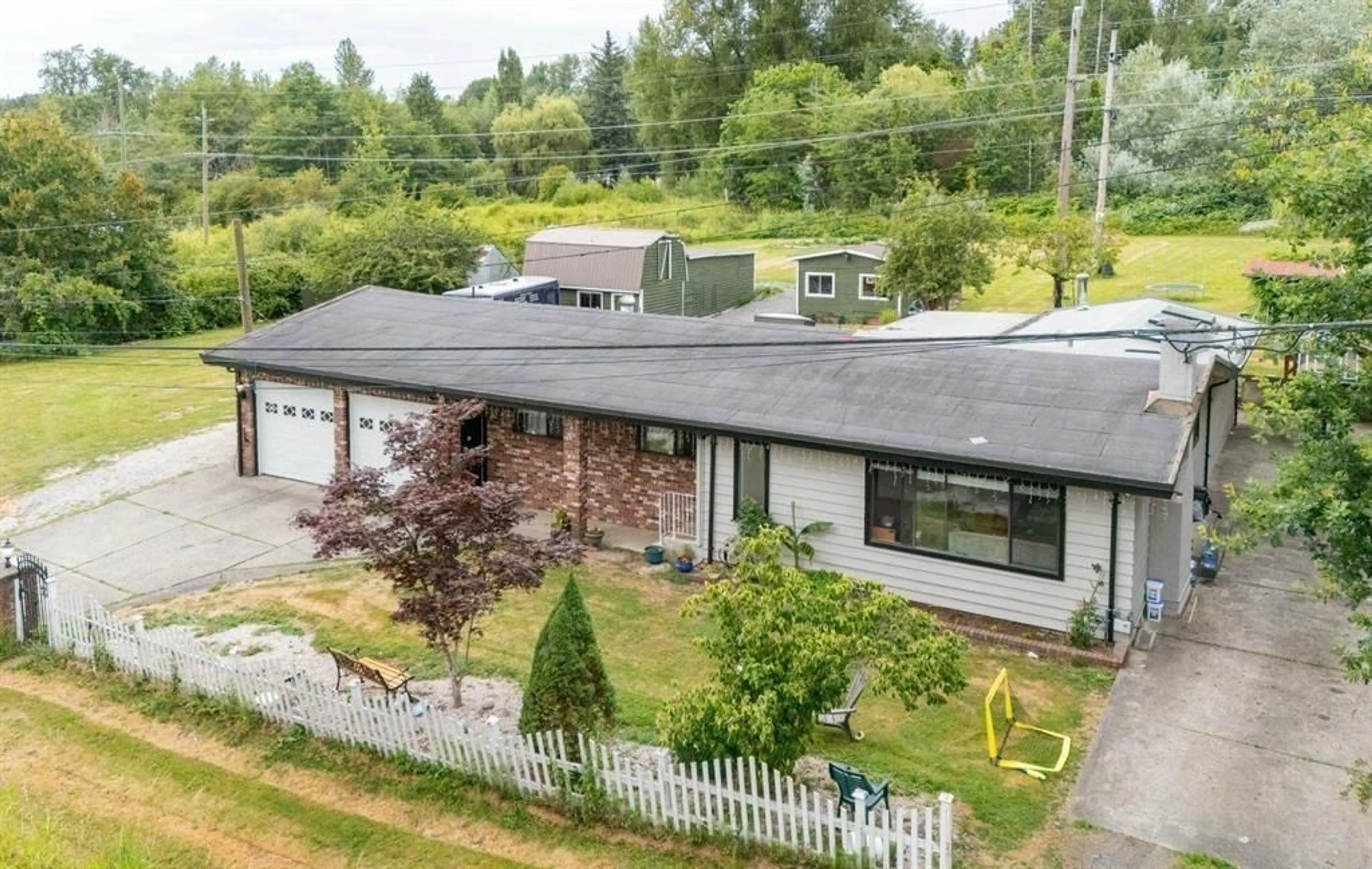 A pic from outside/outdoor area/front of a property/back of a property/a pic from drone, unknown for 16951 94A AVENUE, Surrey British Columbia V4N6H2