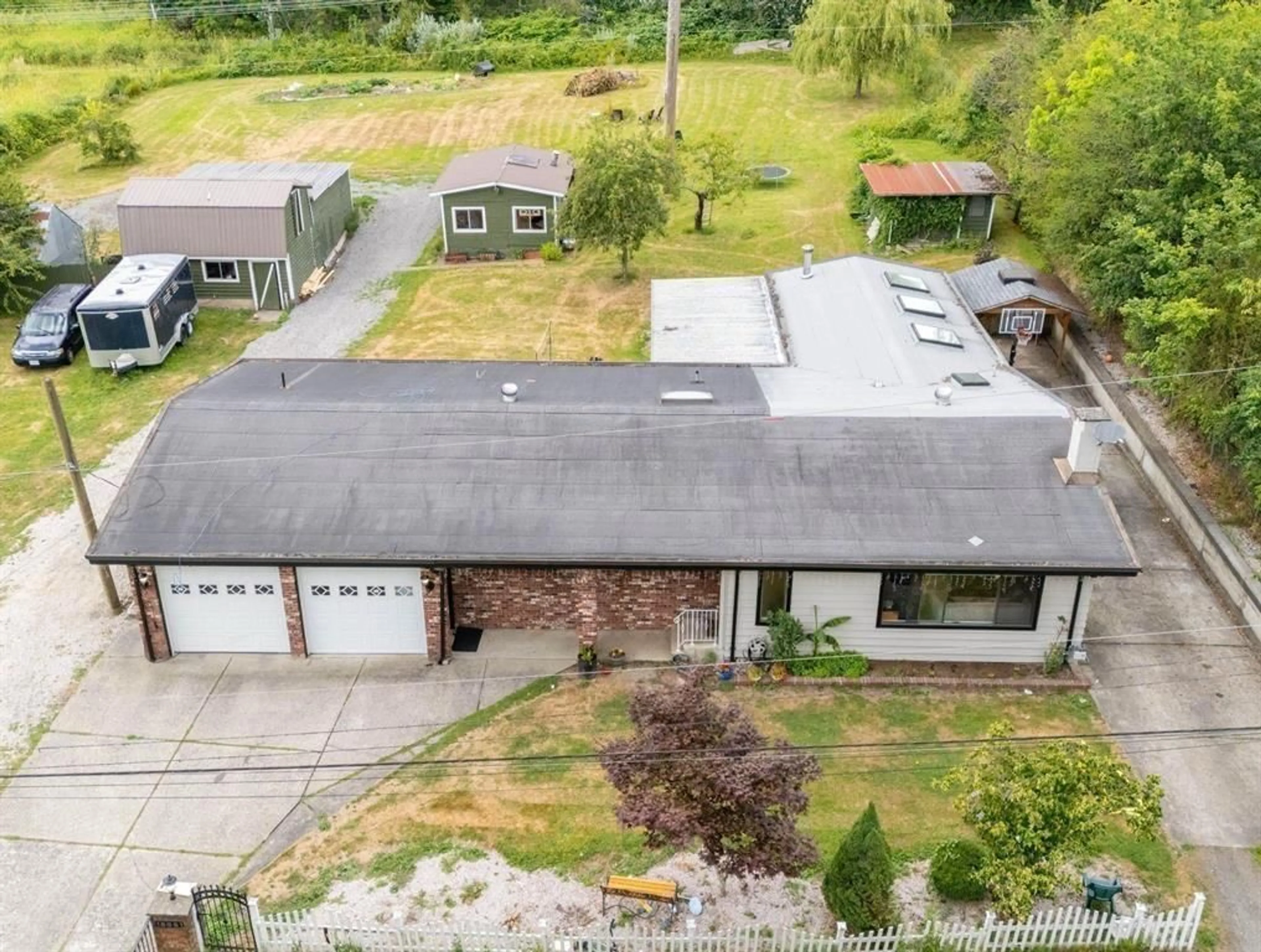 A pic from outside/outdoor area/front of a property/back of a property/a pic from drone, building for 16951 94A AVENUE, Surrey British Columbia V4N6H2