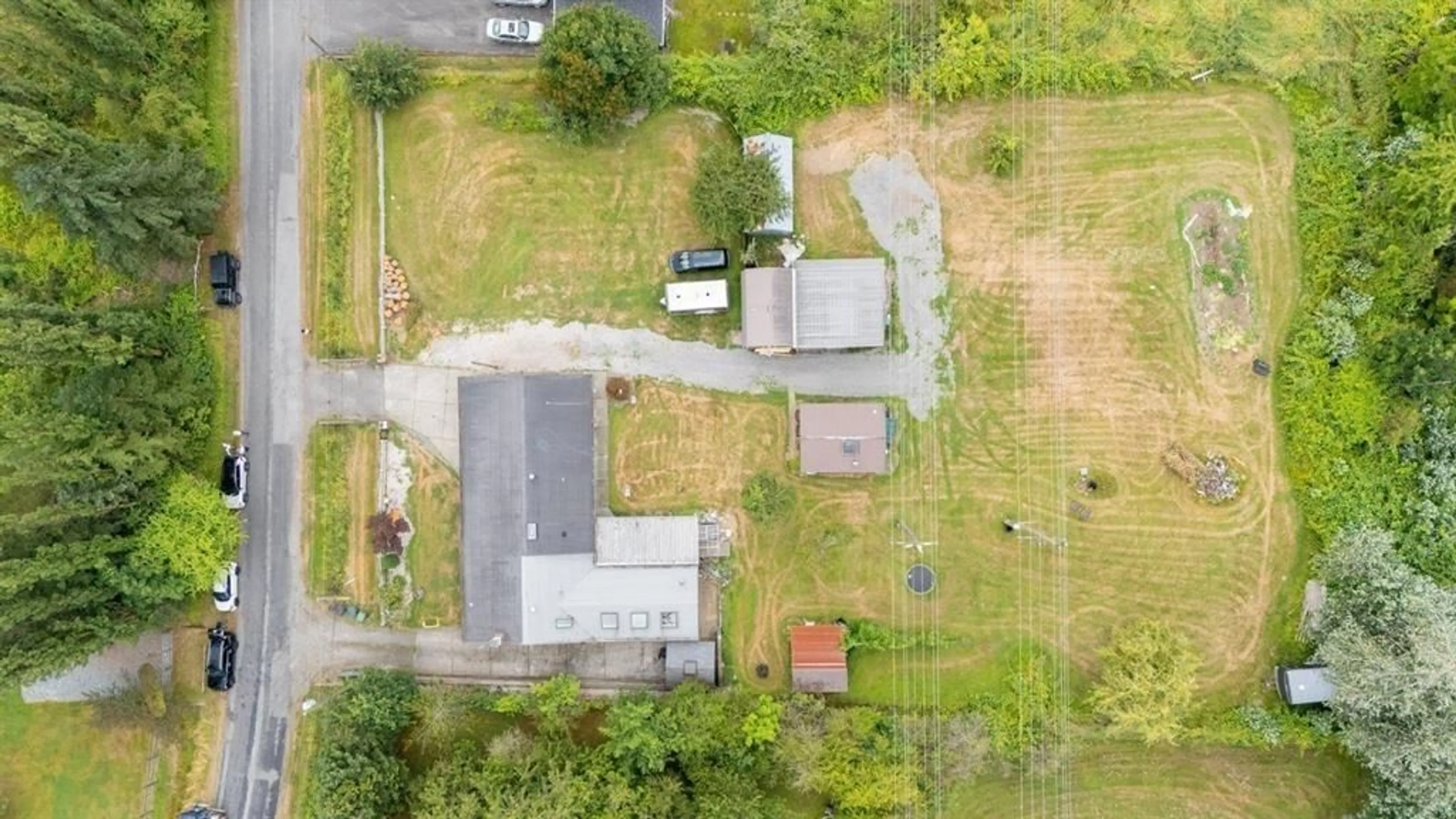 A pic from outside/outdoor area/front of a property/back of a property/a pic from drone, street for 16951 94A AVENUE, Surrey British Columbia V4N6H2