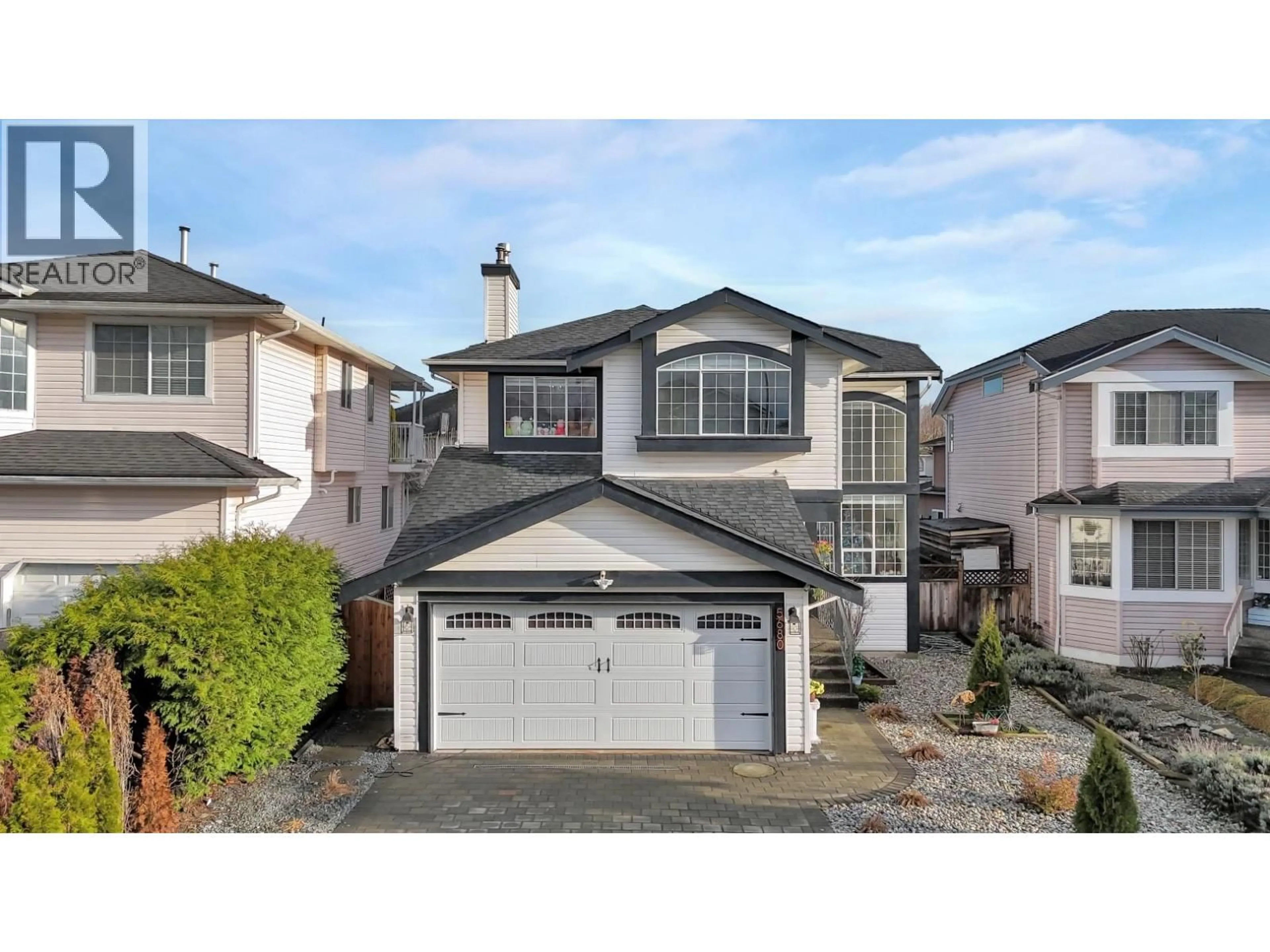 Home with vinyl exterior material, street for 5680 OLIVER DRIVE, Richmond British Columbia V6V2P2