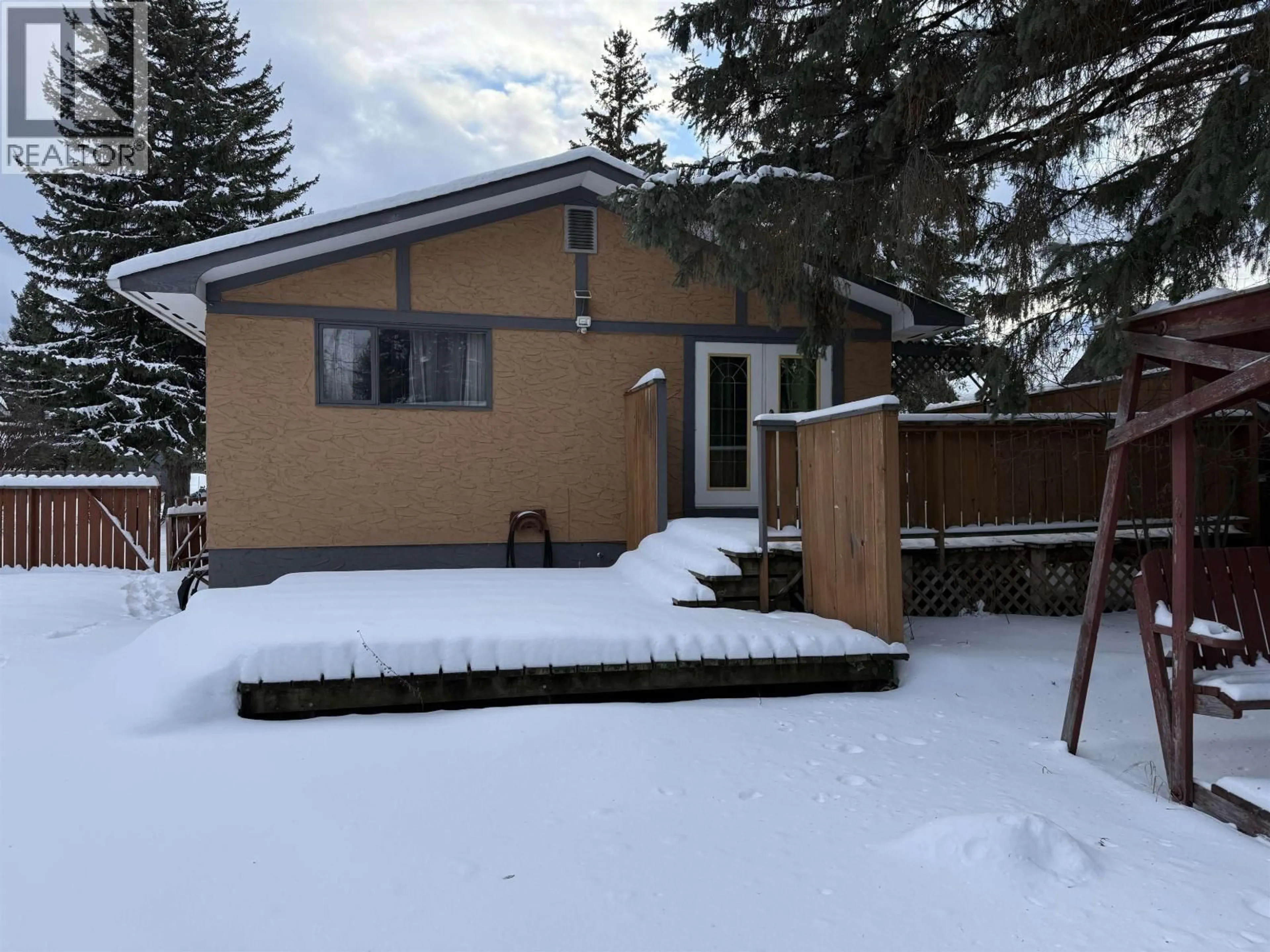 A pic from outside/outdoor area/front of a property/back of a property/a pic from drone, street for 6812 FAIRMONT CRESCENT, Prince George British Columbia V2N2P5
