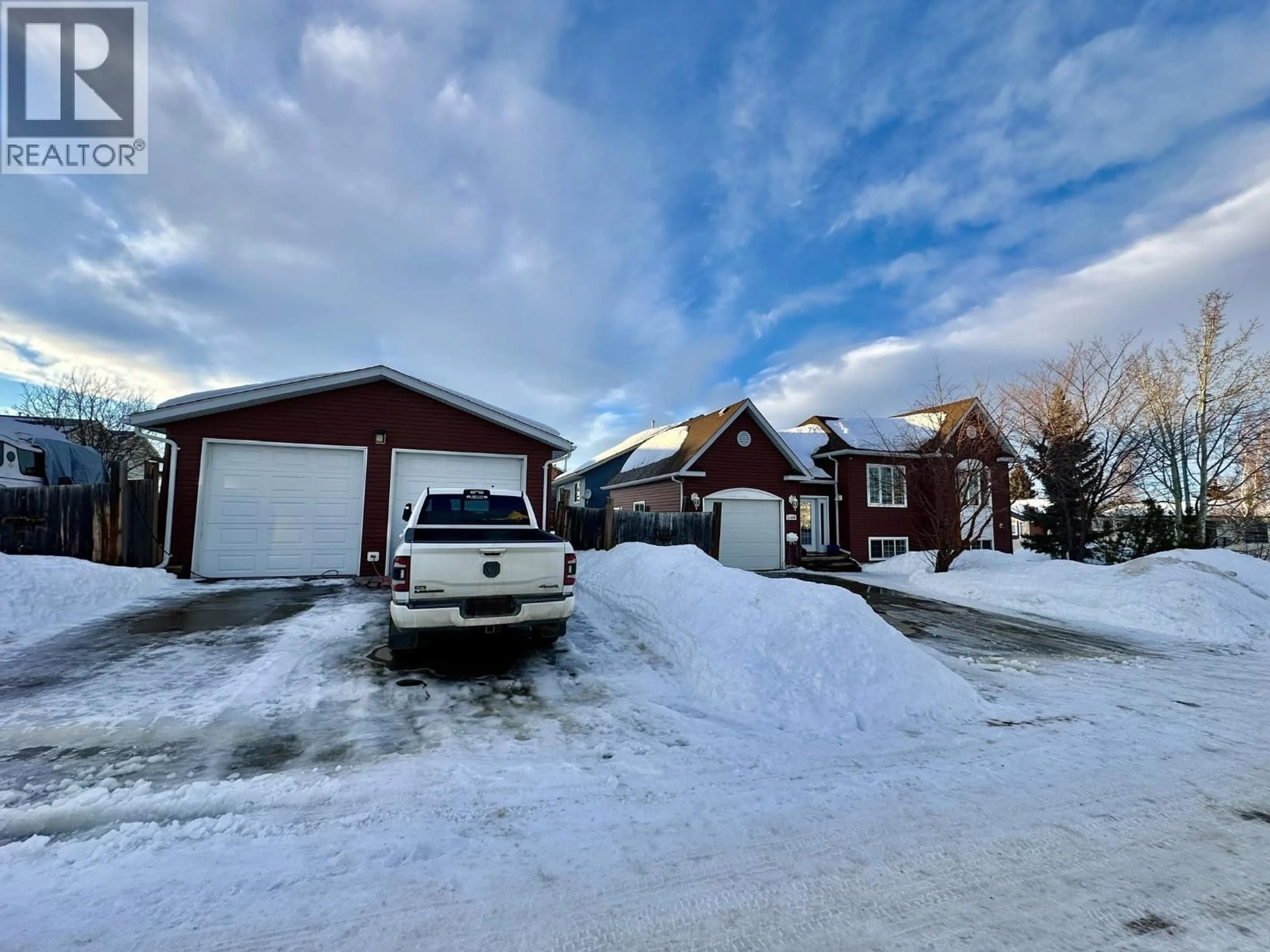 A pic from outside/outdoor area/front of a property/back of a property/a pic from drone, street for 11424 88 STREET, Fort St. John British Columbia V1J0A9