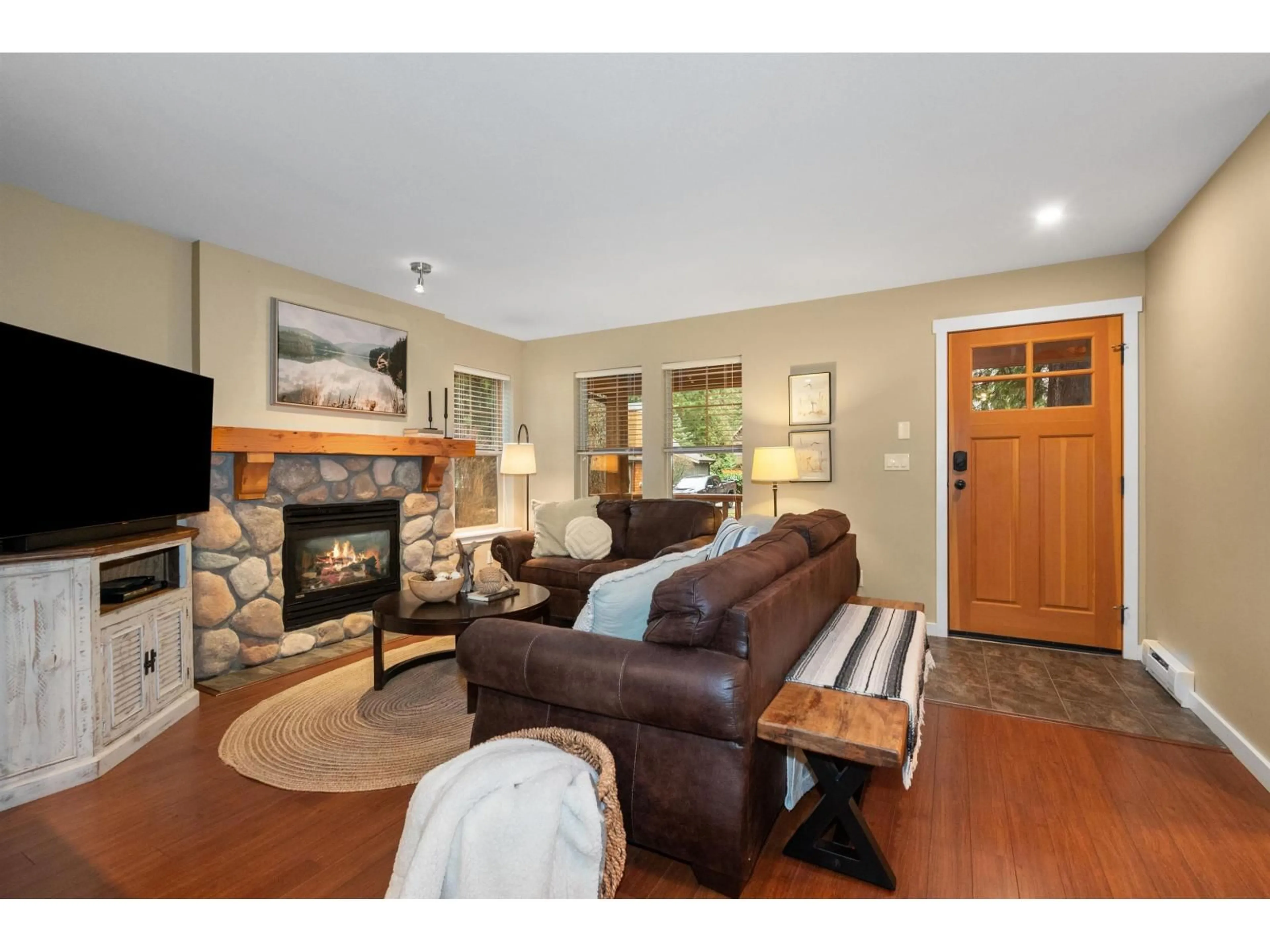 Living room with furniture, wood/laminate floor for 43583 COTTON TAIL CROSSING, Lindell Beach British Columbia V2R0E1