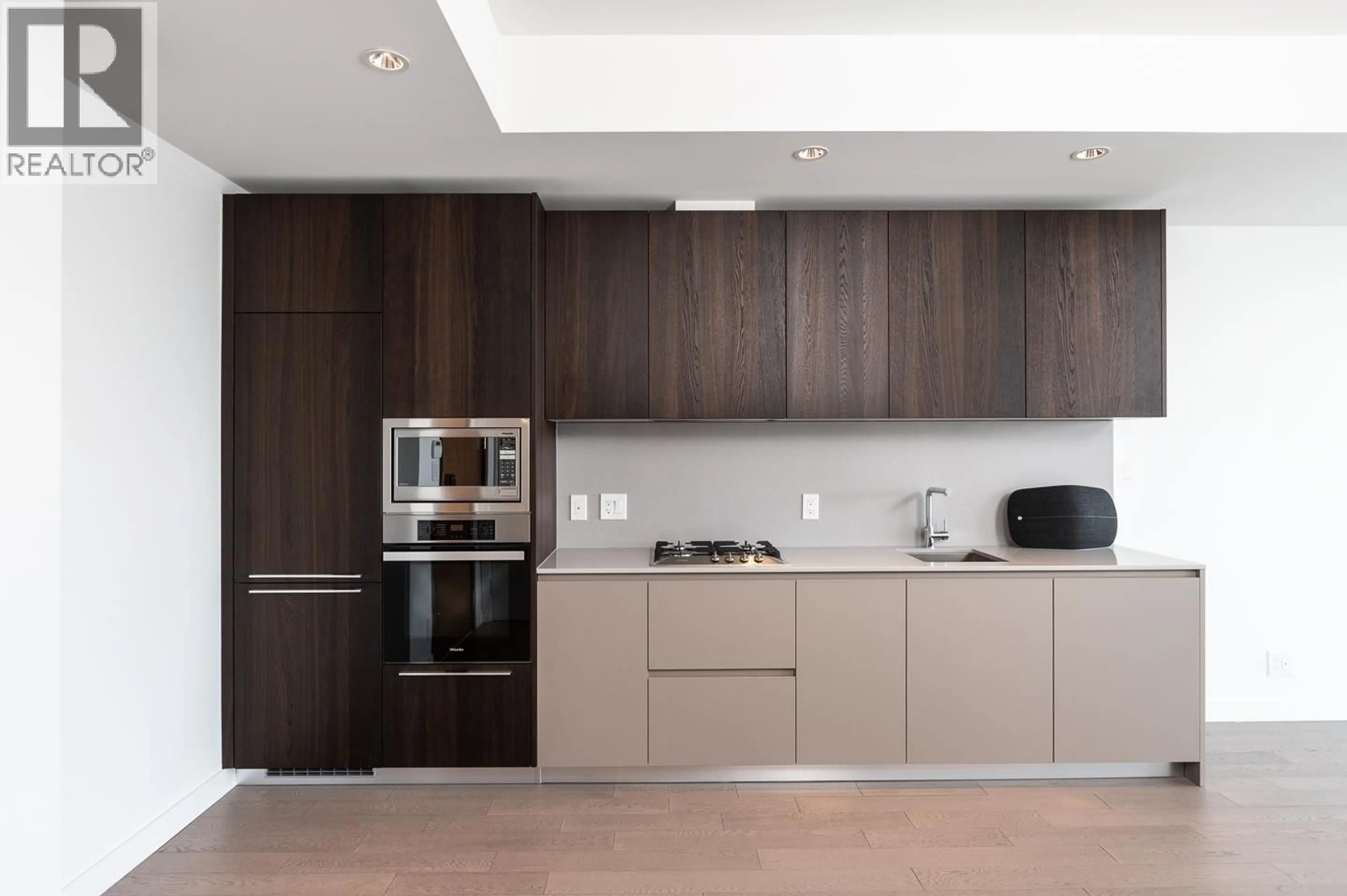 Contemporary kitchen, wood/laminate floor for 702 - 6622 PEARSON WAY, Richmond British Columbia V7C0E4