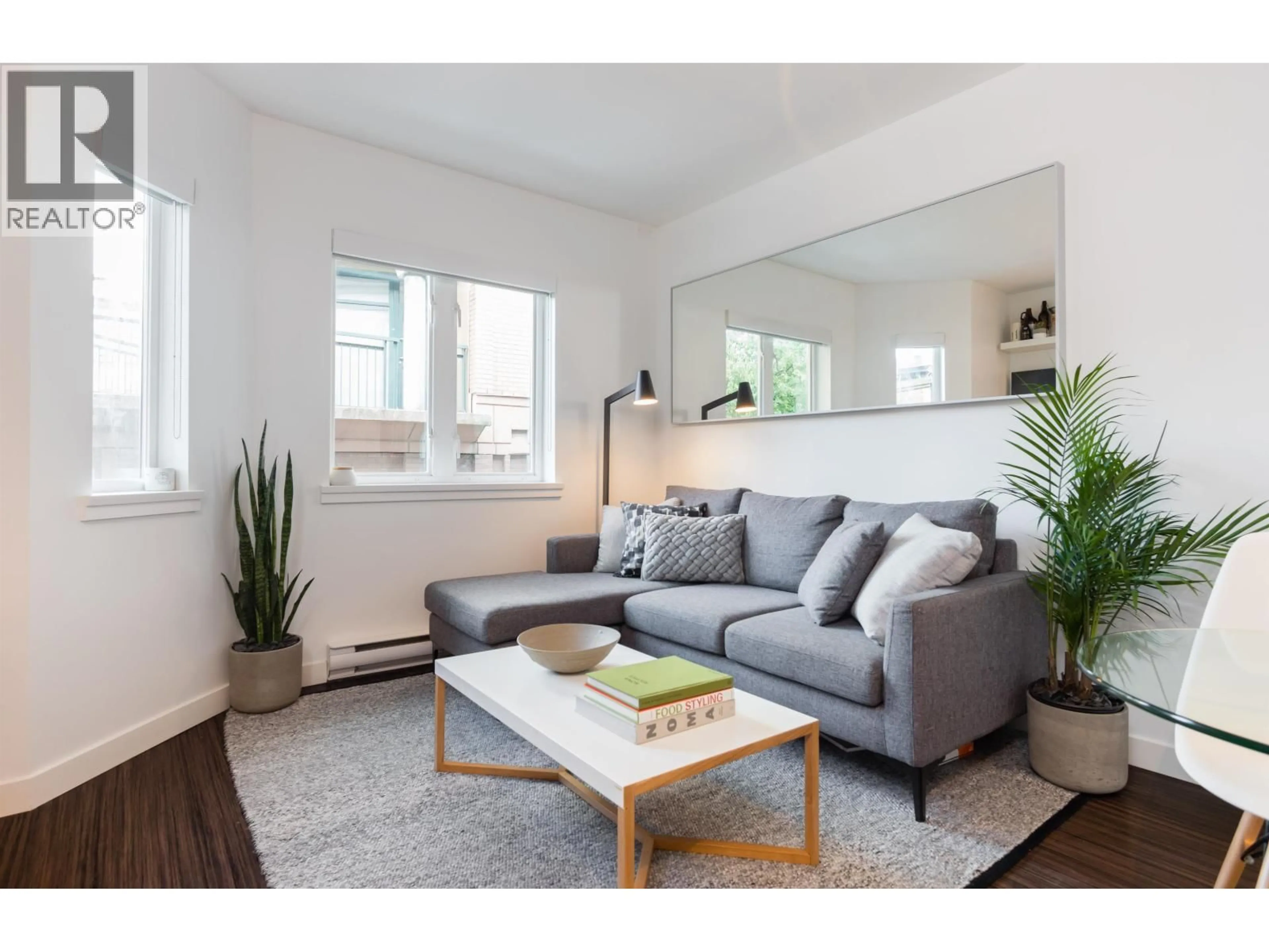 Living room with furniture, wood/laminate floor for 304 - 370 CARRALL STREET, Vancouver British Columbia V6B2J3