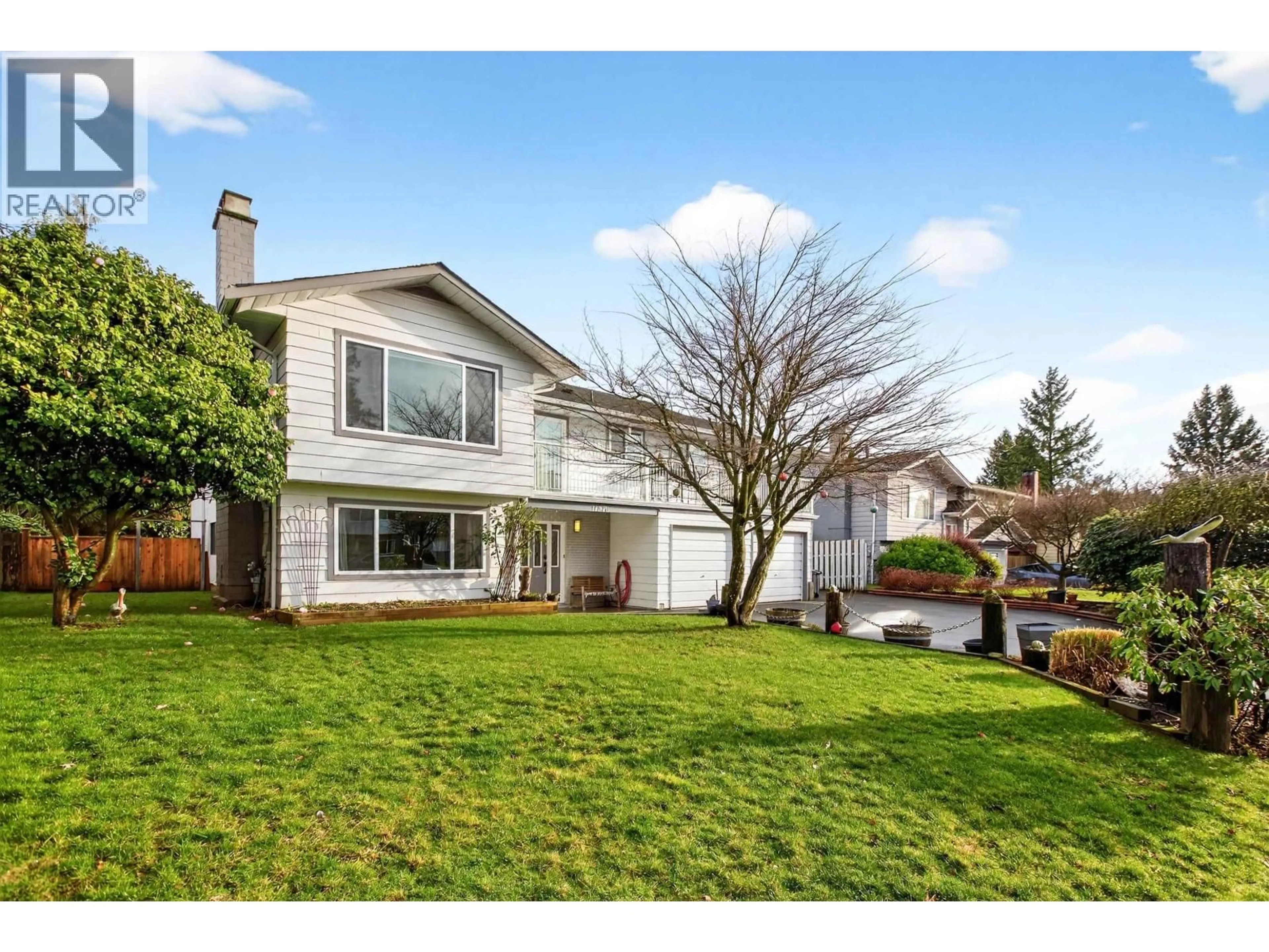 Home with vinyl exterior material, street for 11570 196B STREET, Pitt Meadows British Columbia V3Y1P2